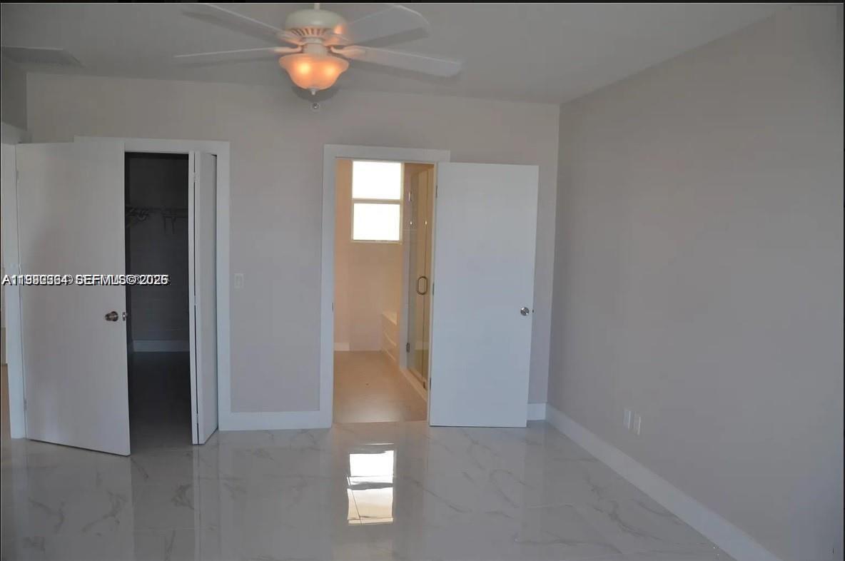 Well-appointed guest bedroom at 555 Dania Beach Blvd - Condo in Dania Beach