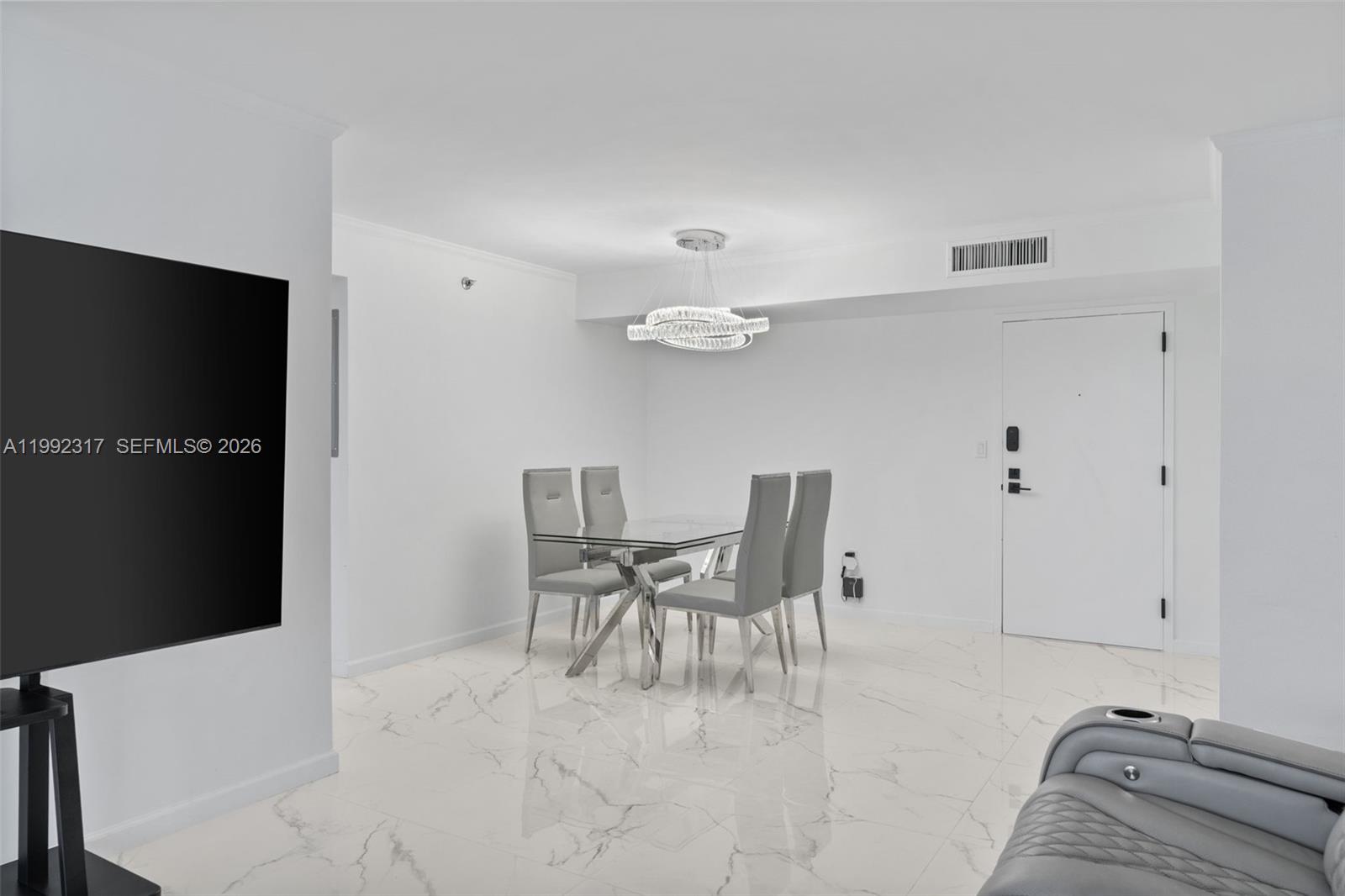 Modern kitchen with designer features at 210 174th St - Condo in Sunny Isles Beach