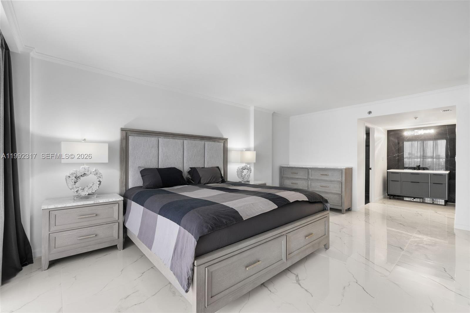 Well-appointed guest bedroom at 210 174th St - Condo in Sunny Isles Beach