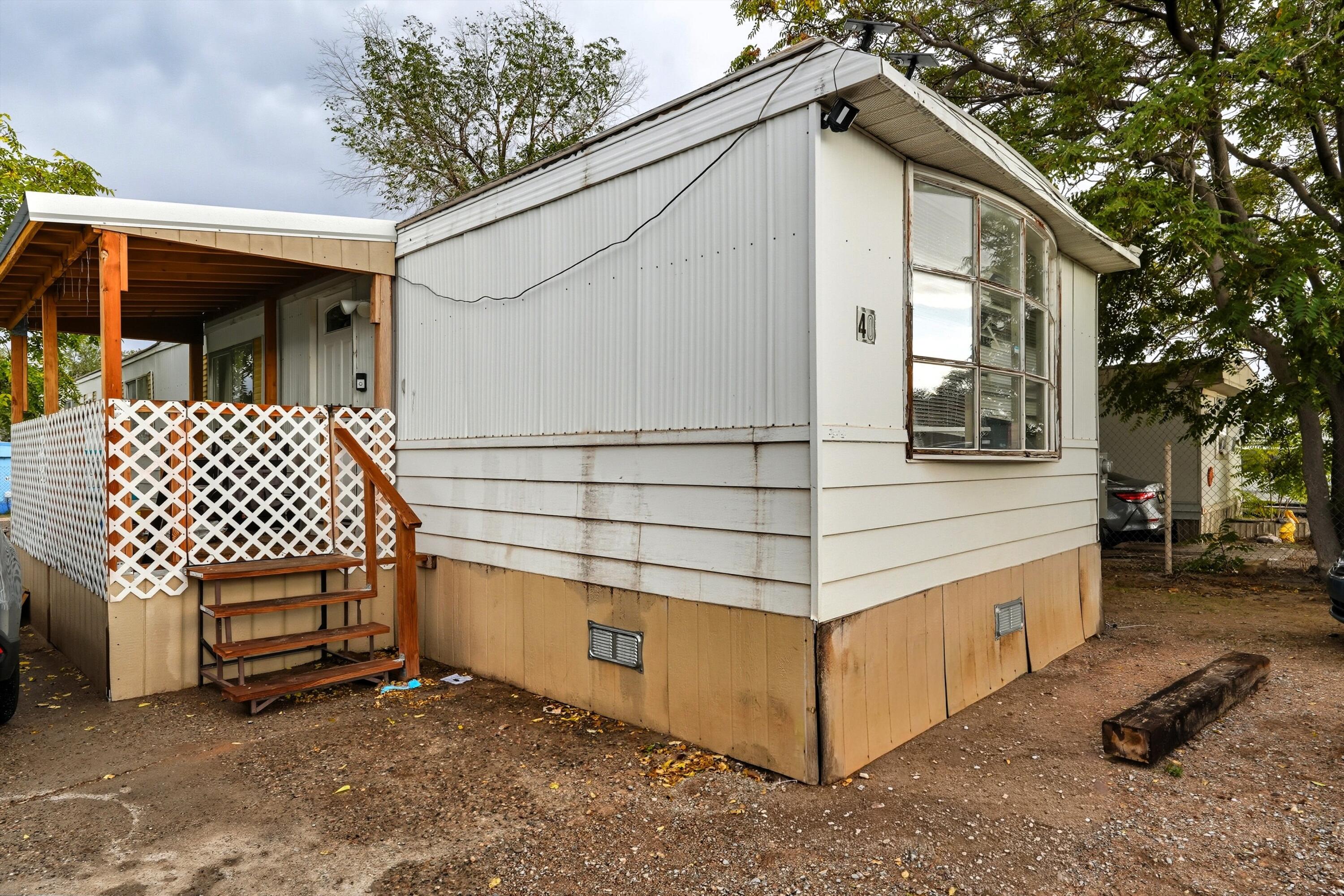 This 2-bedroom, 2-bath mobile home is located in Hacienda del Sol Mobile Home Park. It offers comfortable living space with a functional layout. Perfect for those looking for an affordable and convenient home in a friendly community. Close to local amenities and easy to show. Great opportunity to own in a welcoming park. Schedule your showing today! Investors welcome! **Up to 1% toward closing costs when Prefered lender used ** Owner financing possible with 20k down. Call for details