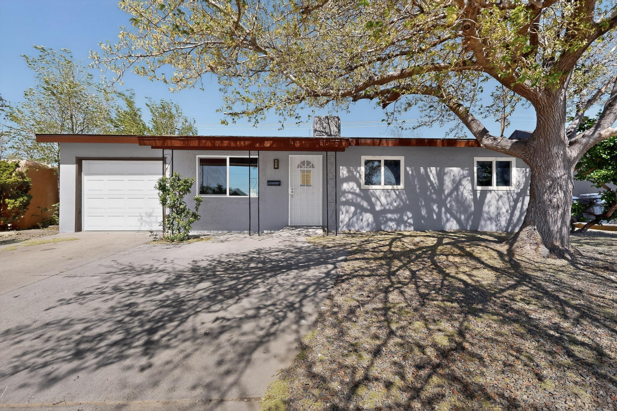 Welcome to this beautifully renovated home. Just renovated, new flooring throughout, fresh paint, new kitchen, stainless appliances, upgraded bathrooms, newer windows, new roof, new HVAC with refrigerated AC. Covered patio. Great location, close to great schools, shopping and dining. Come see this move-in ready home today.