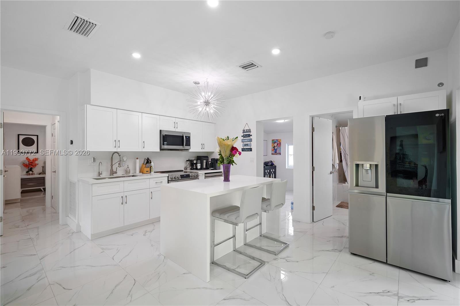 This turnkey single-family home offers comfort and convenience in a desirable East Hallandale neighborhood. Just minutes from the beach and close to supermarkets, this 1,260 sqft house is perfectly situated for easy living. The home features 3 bedrooms and 2 bathrooms. NEW EVERYTHING! Newly updated open concept kitchen showcasing modern design with sleek quartz countertops, fresh cabinetry, and new appliances. Both bathrooms have also been recently renovated with contemporary fixtures and finishes. Enjoy the large fully fenced backyard, complete with a covered patio. Impact-resistant windows throughout provide extra security. The neighborhood is known for its family-friendly atmosphere and nearby playgrounds. Close to Aventura Mall, Gulfstream Casino and Good Schools. Call For Showing!