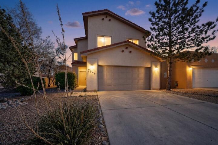 Located in the desirable North Albuquerque area, 7644 Calle Comodo NE offers 2,149 square feet of well-maintained living space with 4 bedrooms and 2.5 bathrooms, perfectly positioned to capture beautiful views of the Sandia Mountains.This thoughtfully cared-for home welcomes you with a functional layout designed for comfortable everyday living and easy entertaining. The spacious living areas flow seamlessly, while the windows invite natural light and frame the stunning mountain backdrop. The kitchen and dining spaces provide the ideal setting for gatherings, and the generous bedrooms offer flexibility for family, guests, or a home office.Well kept and move-in ready, this home presents an excellent opportunity for new owners looking for comfort and a prime location in Albuquerque