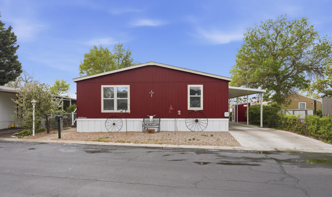 This modern 2022 triplex has four bedrooms, two full bathrooms and an open floor plan. The modern kitchen is spacious & has plenty of room for you to cook up your delights. The neighborhood is peaceful and has 24 hour security. The property is  Located in the Four Hills mobile Home park near the foothills.  Your  can enjoy biking or walking on private streets, and other indoor and outdoor amenities and activities. Social activities are a highlight for residents, for seniors as well as families. And what a luxury to be able to drive up and park right next to your home under the carport avoiding the hassle of a community parking lot. So come live the peaceful life in this Beautiful Home.