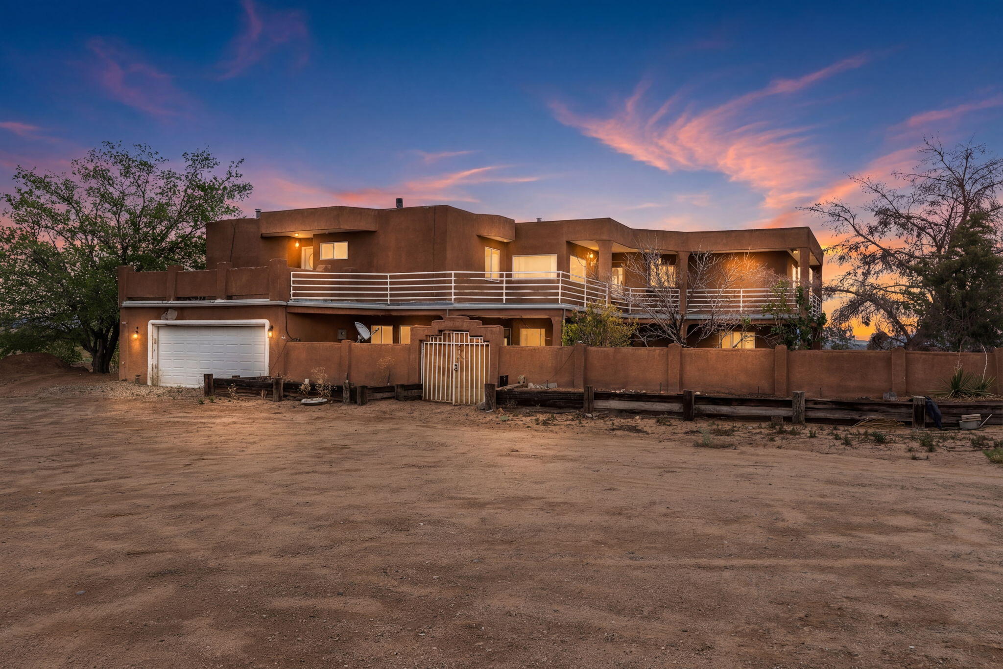 Opportunity awaits with this spacious 3-bedroom, 2.5-bath fixer upper in NW Albuquerque! Offering over 3,000 square feet, this home sits on a generous 1.44 acre lot with stunning mountain, city and petroglyph views offering endless potential. The property features both a 2-car attached garage and an additional 2-car detached garage ideal for hobbies, storage, or workshop space. With a private well and septic already in place, plus access to city utilities, this property offers flexibility for future improvements or expansion. Whether you're an investor, renovator, or buyer looking to create your dream home, this is a rare chance to customize a large property in a desirable neighborhood. Sold AS IS, Cash or possibly Rehab loan