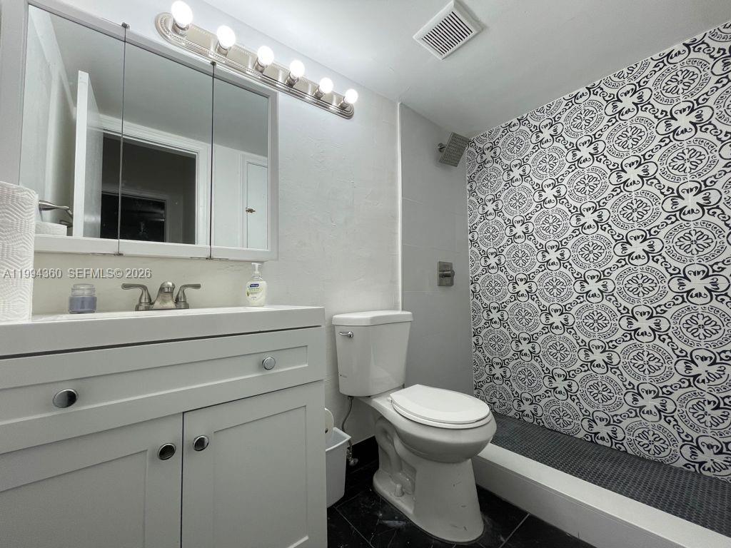 1/1 unit at Casa Granada, a quiet garden condo community centrally located in Palmetto Bay. New kitchen with quartz countertops, remodeled bathroom and shower and laminate flooring throughout, ceiling fan and central air. Enjoy your peace while sitting in the large screened balcony. The community offers a pool and laundry facilities as well as outdoor sitting areas. If you want to live in a quiet community yet be within walking distance of shopping, this is the place for you! One block from US1, near the Falls Shopping Center, Pinecrest and Black Point Marina! One assigned parking, street parking available. This SECOND floor unit has NO ELEVATOR access.  Association approval required.