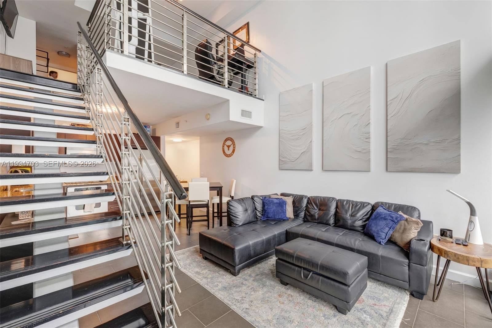 Welcome to Brickell loft-style living at it's finest in this 1 Bedroom, 1.5 Bath with 20ft ceilings!  The largest floor plan of it's kind, a beautiful 1,056sqft 2 story loft!  This modern build open layout allows plenty of natural light, a spacious balcony with city views, updated appliances and washer/dryer in unit.  Newer porcelain floors on 1st level, wood floors in the master and walk-in closet with plenty of space.  Master bath with dual sinks and full size tub+shower.  A building full of amenities including, gym, pool, hot tub, sauna, steam room and more! 1 Assigned parking + cable/internet included.  Conveniently located across from Brickell City Centre with all the best dining, shopping, and entertainment options this area has to offer. Also, walkable public transportation hubs for convenient commuting. So don't miss this opportunity and call today for a private showing!