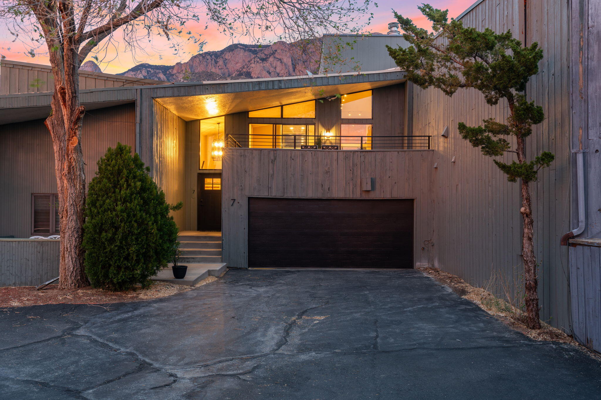 Stunning newly updated home in a highly desirable location, offering breathtaking mountain and sparkling city light views. This beautifully refreshed property features a modern kitchen with updated cabinets, granite countertops and stainless-steel appliances, perfect for both everyday living and entertaining. Enjoy the outdoors from three separate outdoor living areas, ideal for relaxing or hosting guests while taking in the scenery. Inside, an abundance of natural light fills the open floor plan, complemented by all solid surface flooring for a clean, modern look and easy maintenance. The oversized living area features a cozy fireplace and additional space suited for a home office, reading nook or flex area. Ideally located close to amenities, shopping, dining, and outdoor activities.
