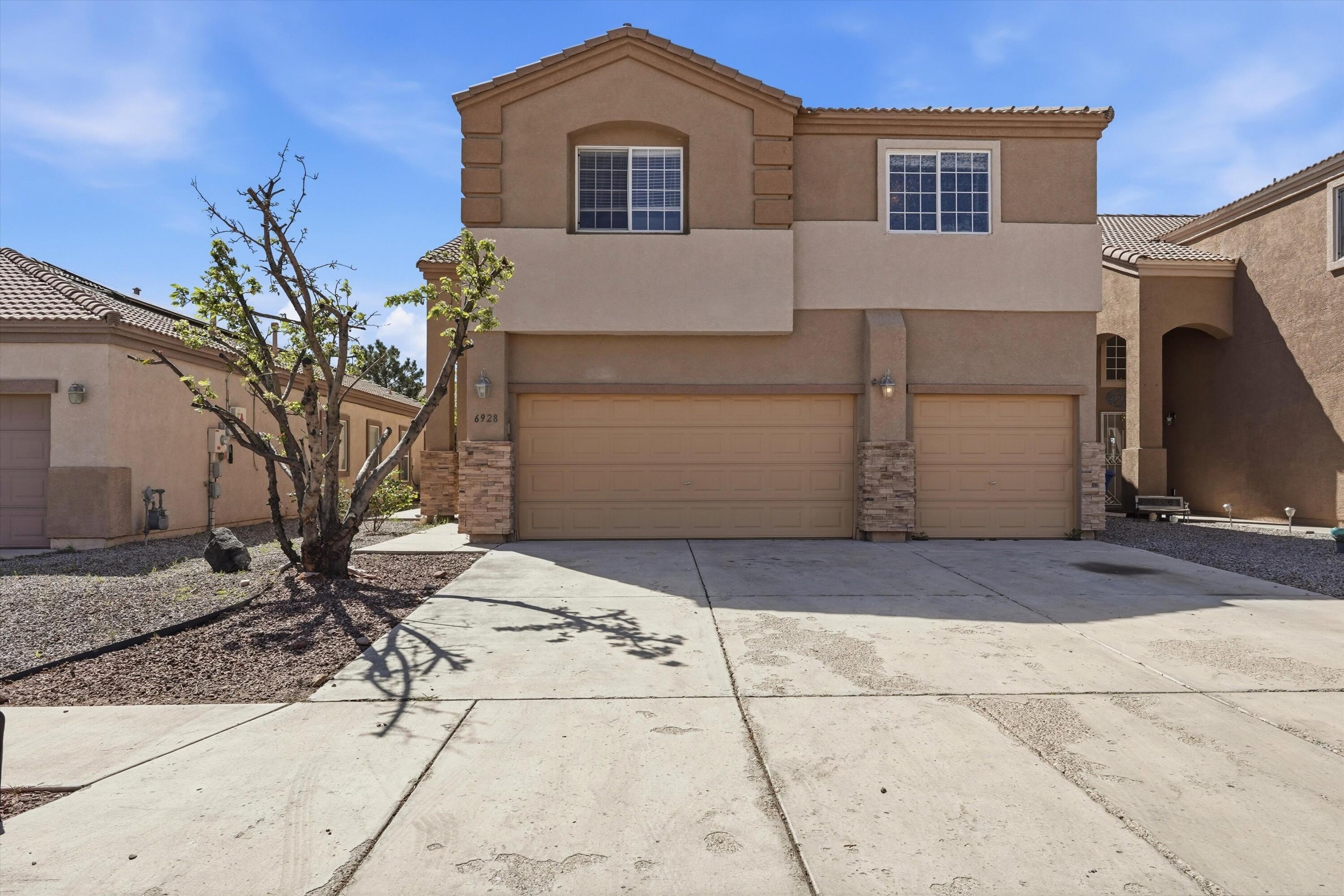 Gorgeous 2,932 sq ft home just minutes from Volcano Vista High School! This well-loved abode features little to no electric bills with a full paid solar array and open lighting. Major energy savings and new refrigerated air conditioners for year round comfort. The open floor plan includes 5 bedrooms and 4 bathrooms, with a downstairs primary bed/ bath handrail accessible layout for safety. Spacious bedrooms, a 3-car garage, and a new storage shed offer plenty of space. Everything in the home has been recently updated and well cared for. The backyard opens to a beautiful park with no rear neighbors and great views. Come see your new home today. Don't miss out on this one!