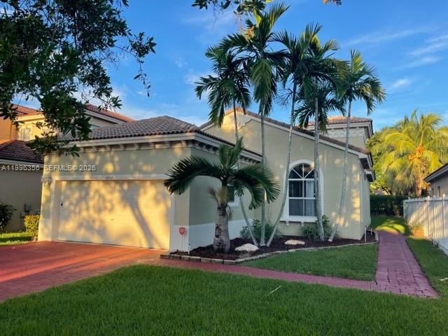ONE STORY 3 BR/ 2 BA HOME W/ 2 CAR GARAGE IN GATED COMMUNITY OF PORTOFINO LAKES IN WATERSTONE. TILE FLOORS THROUGHOUT. LARGE OPEN KITCHEN W 42 INCH CABINETS, SS APPLIANCES AND BREAKFAST NOOK. ALSO OFFERS SPACIOUS MASTER SUITE AND COVERED TERRACE. RENT INCLUDES: GATED ENTRY, LAWN MAINTENANCE & CLUBHOUSE ACCESS.