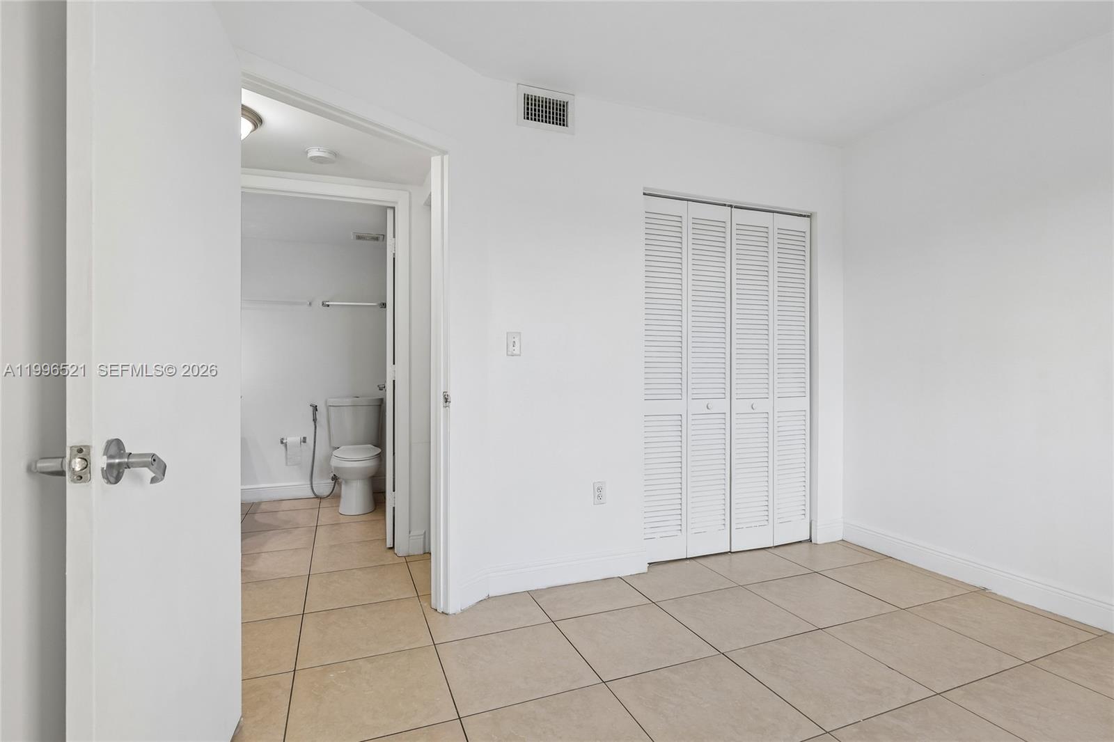 Well-appointed guest bedroom at 4137 Stirling Rd - Condo in Dania Beach