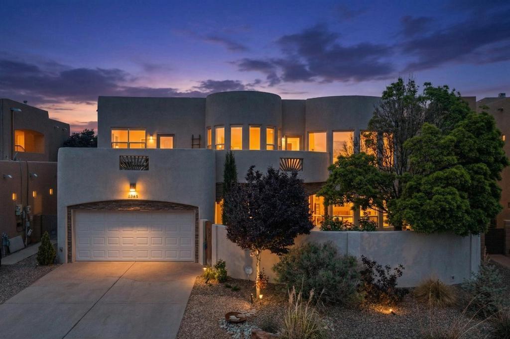 VIEWS, VIEWS, VIEWS, TPO roof, refrigerated air and oversized garage for toys.  Designed for the ''wow'' factor, featuring soaring tongue-and-groove ceilings with authentic vigas and cozy radiant heating underfoot and an oversized primary suite!  Outdoor sanctuary with a private, gated front courtyard for morning coffee. A massive covered back patio for shaded afternoon lounging and an elevated view deck with dual entrances, offering the most pristine mountain and city views. New TPO roof, high-efficiency water heater, water softener and refreshed decking.  One of the largest floor plans in Trinity Estates!