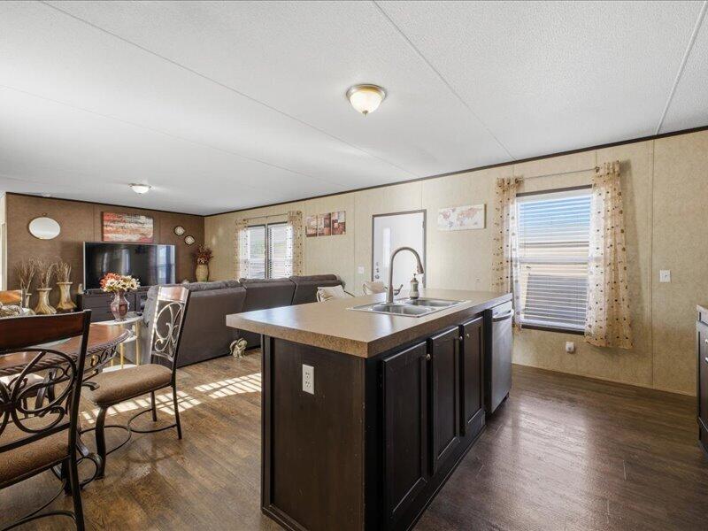 This beautiful home features an open floorplan in a nicely located neighborhood. The home features separate primary and secondary bedrooms with a modern touch. The newer appliances are included: washer, dryer, refrigerator, stove, dishwasher, and microwave. The community features a playground, community pool, clubhouse, and basketball court. The location is ideal with many shopping and dining options within a few minutes. You don't want to miss this turn key home.