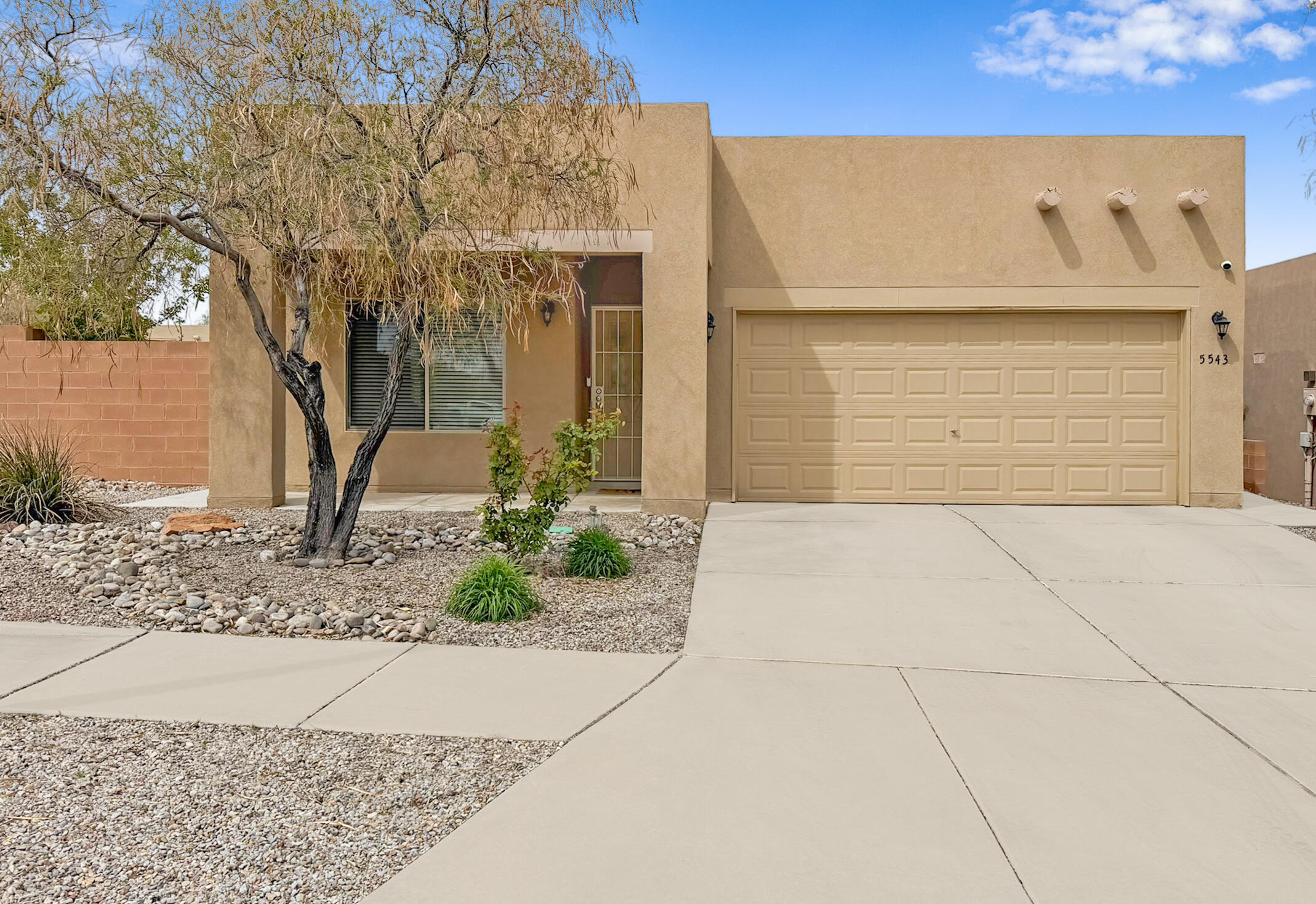 This beautifully maintained single-story home checks every box. Bright open floor plan with tons of natural light. The kitchen offers granite countertops and an island with seating space ideal for daily living and entertaining. Tile floors in the main areas. Two living spaces plus a built-in desk give you plenty of room to spread out.The oversized master suite includes a large walk-in closet, his-and-hers sinks, separate shower, and garden tub. Both bathrooms feature refreshed mirrors and lighting.Located on a premium corner lot in the desirable Vista de la Luz subdivision with easy-maintenance landscaping and an updated backyard with covered patio. Enjoy great views from the front porch and benefit from the 16 panel solar system.Excellent Westside location.