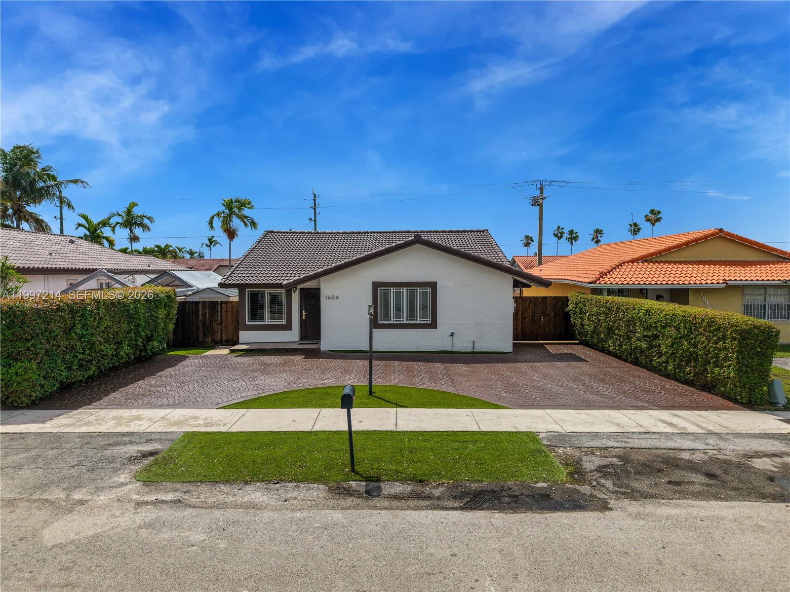 Spacious single-family home nestled in a quiet, established Miami neighborhood, just minutes from the Florida Turnpike, FIU, major roads, top shopping, and entertainment. This move-in ready home offers an updated kitchen with stainless steel appliances, renovated bathrooms, high-hat ceiling lighting, a newer A/C unit, tile flooring throughout, and generous closet space in every room. Step outside to a stunning wood-finished covered terrace — the perfect setting for family gatherings and weekend entertaining — surrounded by a fully fenced yard with wood and concrete privacy fencing and a low-maintenance landscape designed so you can simply relax and enjoy it. Boat parking included.