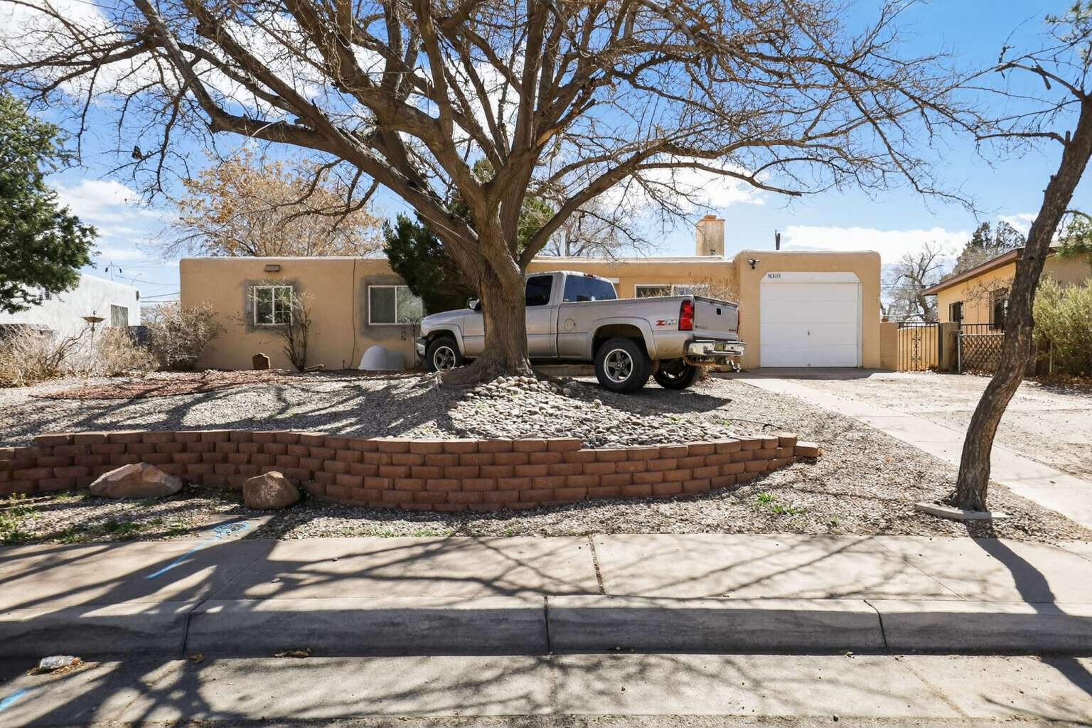 This 3-bedroom, 2-bathroom home in Albuquerque's established Snow Heights neighborhood features a spacious 1,616 sq. ft. layout with no carpet throughout and a convenient garage. Situated on a generous 9,199 sq. ft. lot, the property offers ample outdoor space and incredible proximity to the premier shopping and dining at ABQ Uptown. Its central Northeast Heights location ensures a functional living environment with quick access to major thoroughfares and local amenities.