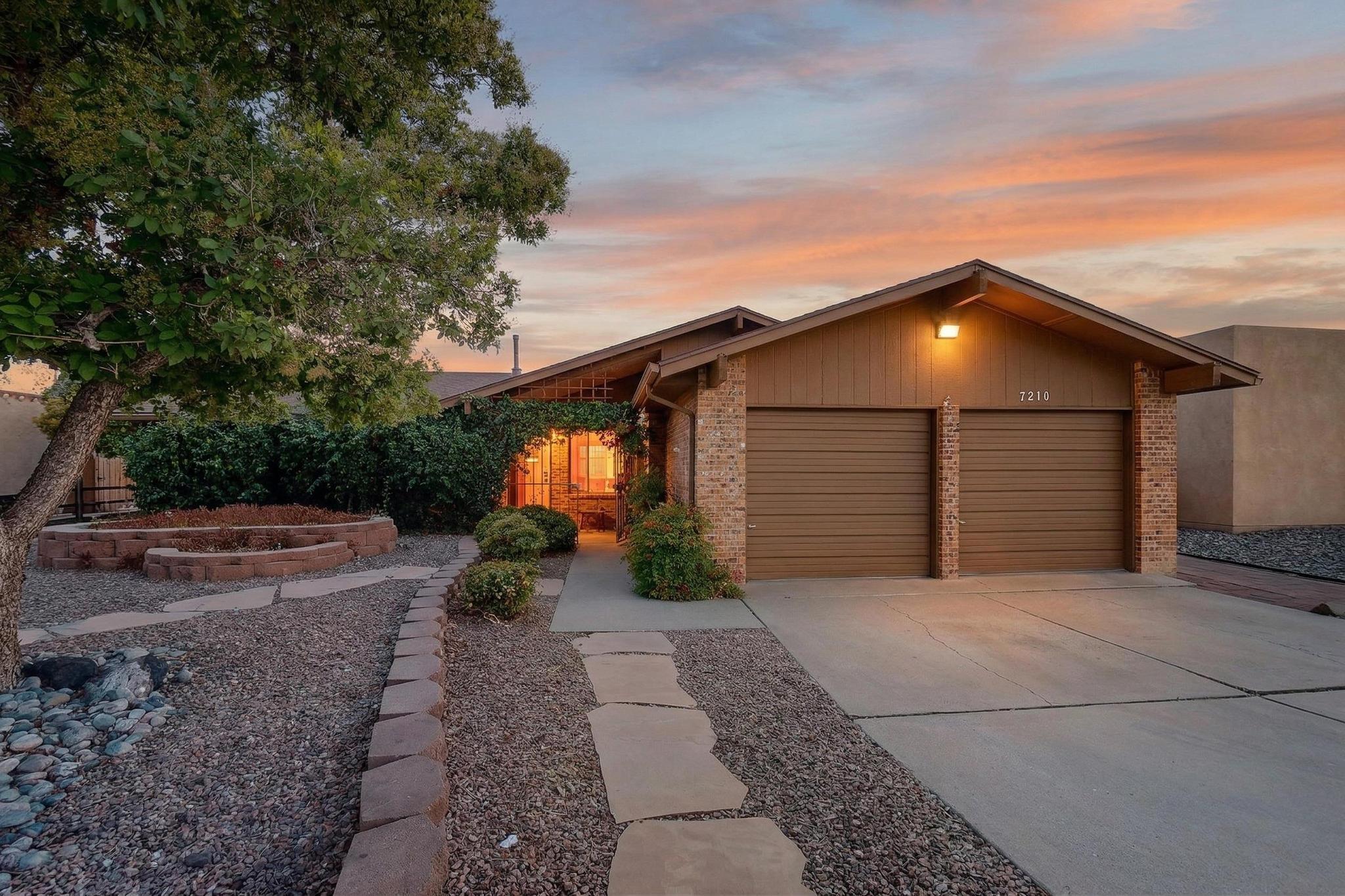 Enjoy panoramic mountain views from the back porch of this Taylor Ranch home, set on a large lot with plenty of space to make it your own. Inside, you'll find a great start with newer laminate flooring (3/26) through much of the home and updated bathrooms that bring a fresh, cohesive feel. The kitchen offers an opportunity for your personal updates and design vision, and two comfortable living areas provide flexibility for both everyday living and entertaining. Step outside to take in those beautiful views and imagine the potential to create your ideal outdoor space. Conveniently located near parks, trails, shopping, and dining, this home offers a solid foundation with room to add your own style and value.