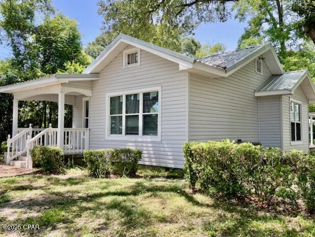 2nd image of 1038 E 8th Avenue, Graceville, FL 32440 | MLS# 788138