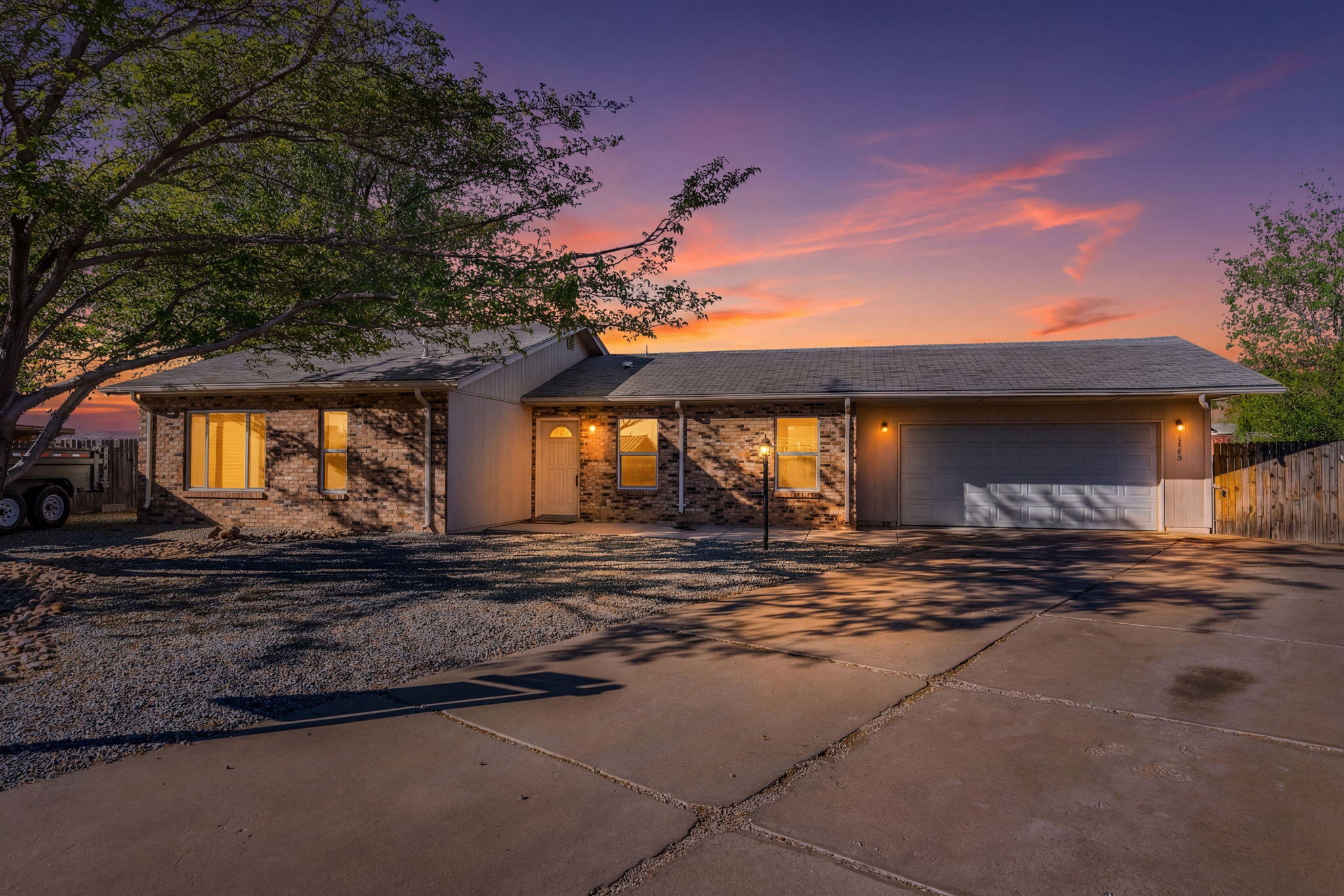Charming cul-de-sac ranch home with thoughtful upgrades and energy-efficient features throughout. Enjoy durable brick and cement board exterior, updated double-pane windows and inviting front and back porches. Interior features tile flooring, an upgraded kitchen with newer countertops, gas range, refrigerator, dishwasher, and modern fixtures. The spacious laundry room offers flexible space for storage, hobbies, or a workspace. Step outside to a fenced backyard with a concrete patio, perfect for relaxing or entertaining. Home backs up to city-maintained trails with no backyard neighbors!