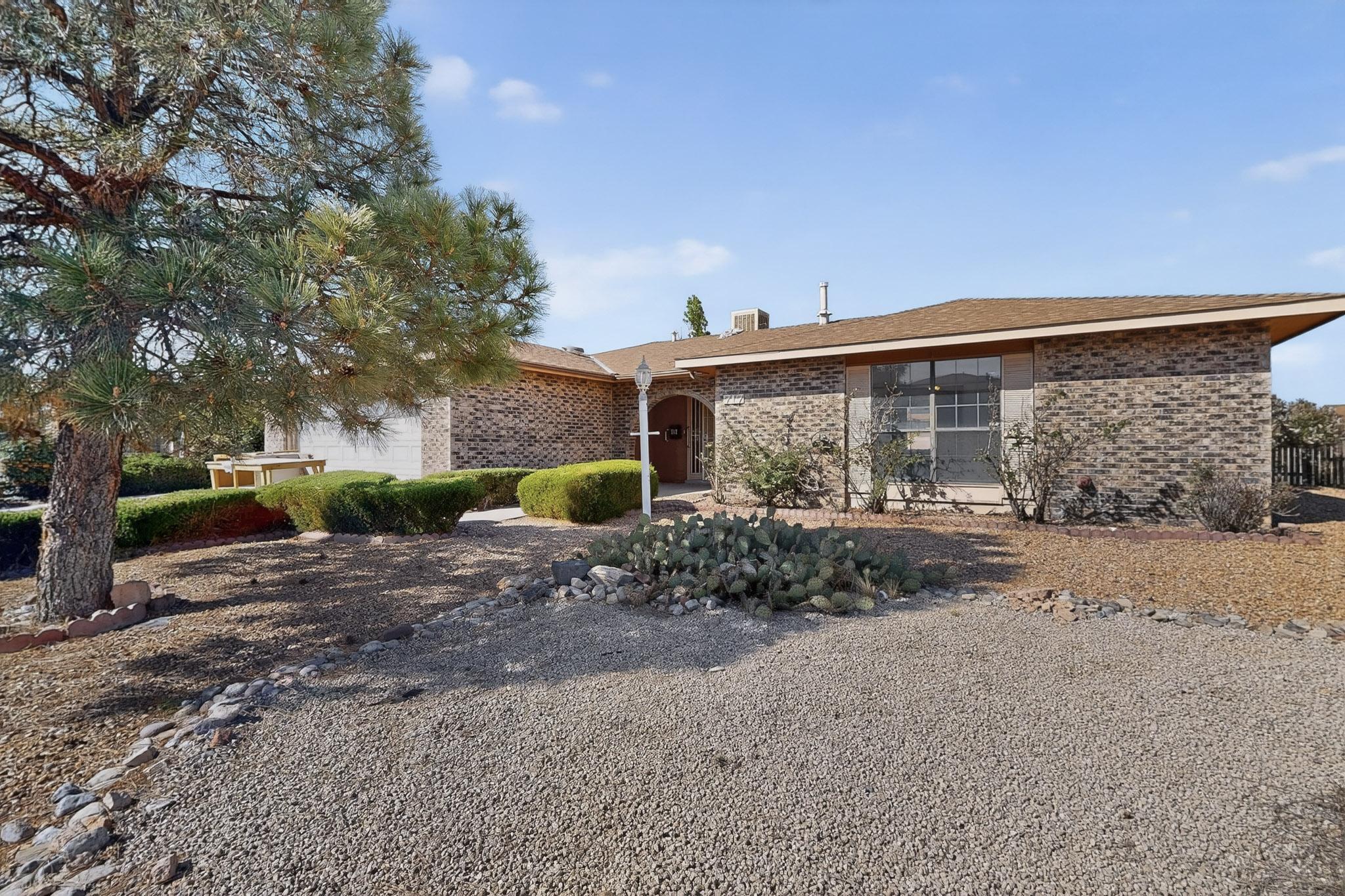 Charming and inviting, this Rio Rancho home offers comfort, flexibility, and space to enjoy both inside and out. Featuring fresh paint and brand-new carpet, the home feels move-in ready from the moment you step inside.The thoughtfully designed layout includes a cozy living room with a fireplace, perfect for relaxing evenings, a separate dining room, and a bright breakfast nook for everyday meals. There is an additional flex room that offers endless possibilities. This would be an ideal space for a game room, family room, home office, or a flex space to suit your needs.Step outside to a large backyard complete with a deck, offering the perfect spot for outdoor entertaining or creating your own retreat--ideal for a hot tub or above-ground pool setup.
