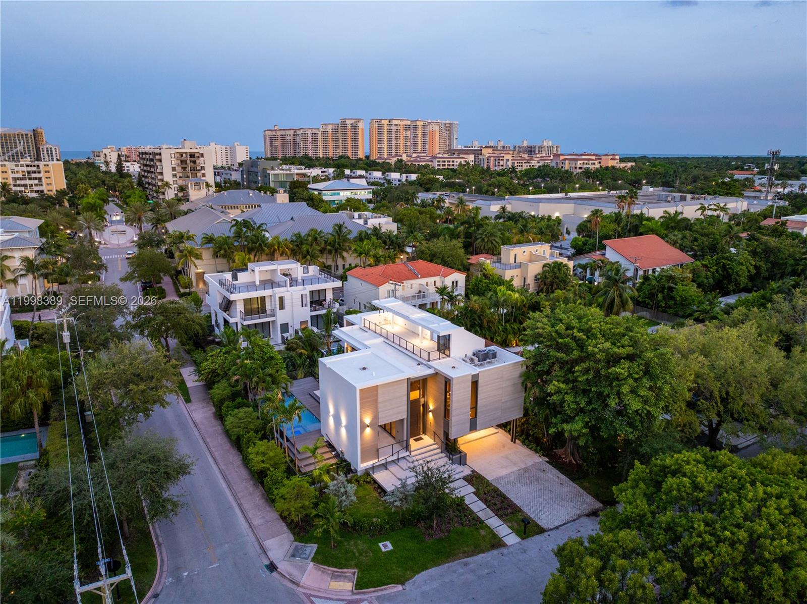 Brand-new construction completed at the end of 2025 in one of the most prestigious locations in Key Biscayne, Florida. This exceptional ultra-luxury residence features 5 spacious bedrooms, 7 bathrooms, and a modern architectural design with top-of-the-line finishes throughout.The home is highlighted by soaring double-height ceilings and expansive impact windows that flood the interiors with natural light, creating a bright, open, and sophisticated atmosphere.Situated on a corner lot, the property offers enhanced privacy and a flawless layout. The outdoor spaces are designed for both entertainment and relaxation, featuring a private rooftop terrace with a summer kitchen, a brand-new garden, beautifully landscaped green areas, and lush greenery surrounding the pool, creating a true resort-style environment.Seamless indoor-outdoor living defines the home, ideal for experiencing Miami’s luxury lifestyle at its finest.Located just minutes from the beach, parks, and top-rated schools, this residence offers the perfect combination of prime location, exclusivity, and long-term value.The seller offers flexible delivery: the property can be delivered vacant at closing or with a leaseback option, allowing the seller to remain as a tenant for 12 months at $250,000 for the first year.A rare opportunity for discerning buyers seeking a brand-new, move-in-ready luxury home or an immediate income-producing asset in one of South Florida’s most desirable communities.