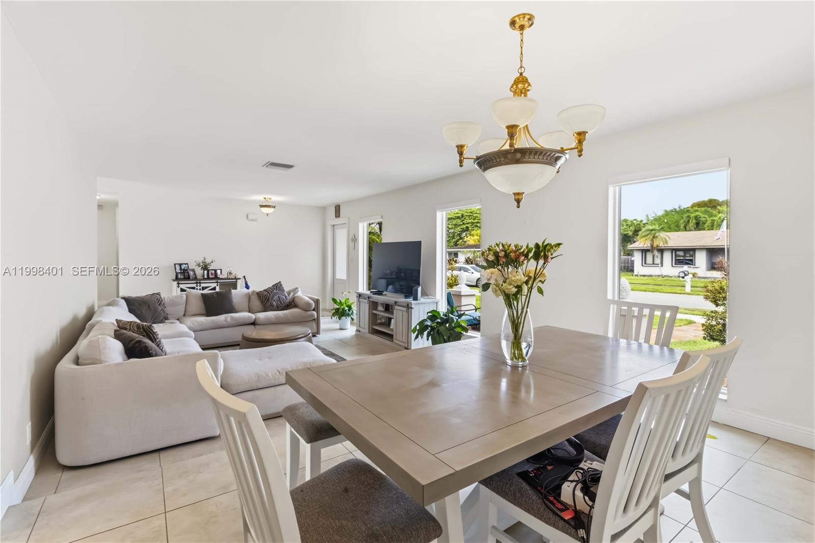 Welcome to your perfect family home in the heart of Cutler Bay’s desirable Saga Bay community. This beautifully maintained 4-bedroom, 2-bathroom single-story residence sits on a spacious 10,076 sq ft lot, offering the ideal blend of comfort, space, and lifestyle. Step inside to a bright, open living and dining area filled with natural light, creating a warm and inviting atmosphere for everyday living and entertaining. The upgraded kitchen serves as the centerpiece of the home, designed for both functionality and connection. With 1,744 sq ft of living space, this home offers generously sized bedrooms, perfect for growing families, guests, or a home office setup. The true highlight is your private backyard oasis. Enjoy a sparkling pool, covered patio, and a large wrap-around yard, ideal for weekend gatherings, kids at play, or relaxing evenings under the Miami sun. The fully fenced yard provides privacy and peace of mind. Located in a quiet, family-friendly neighborhood, Saga Bay is known for its community feel, nearby parks, schools, and convenient access to shopping and dining. If you’ve been searching for a move-in ready pool home in Cutler Bay with space and a true neighborhood feel, this is the one.