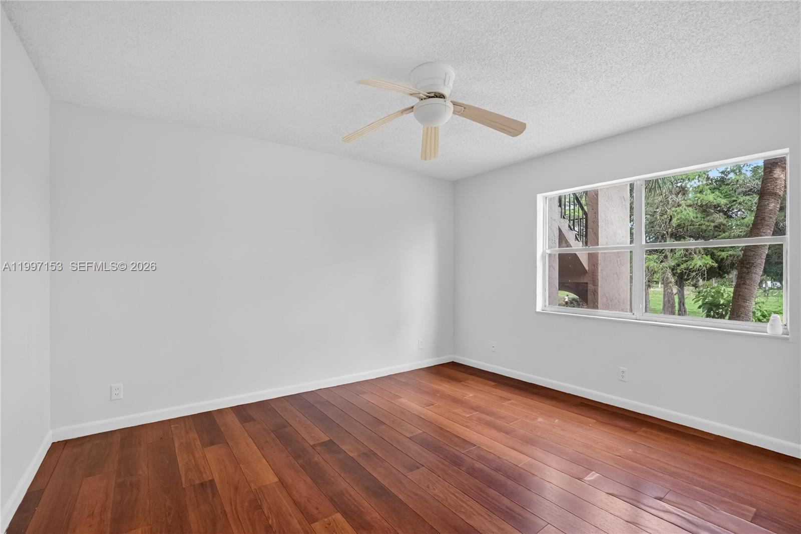 Well-appointed guest bedroom at 6201 Falls Cir Dr - Condo in Lauderhill