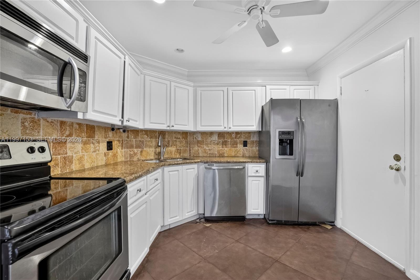 Well-appointed guest bedroom at 6201 Falls Cir Dr - Condo in Lauderhill