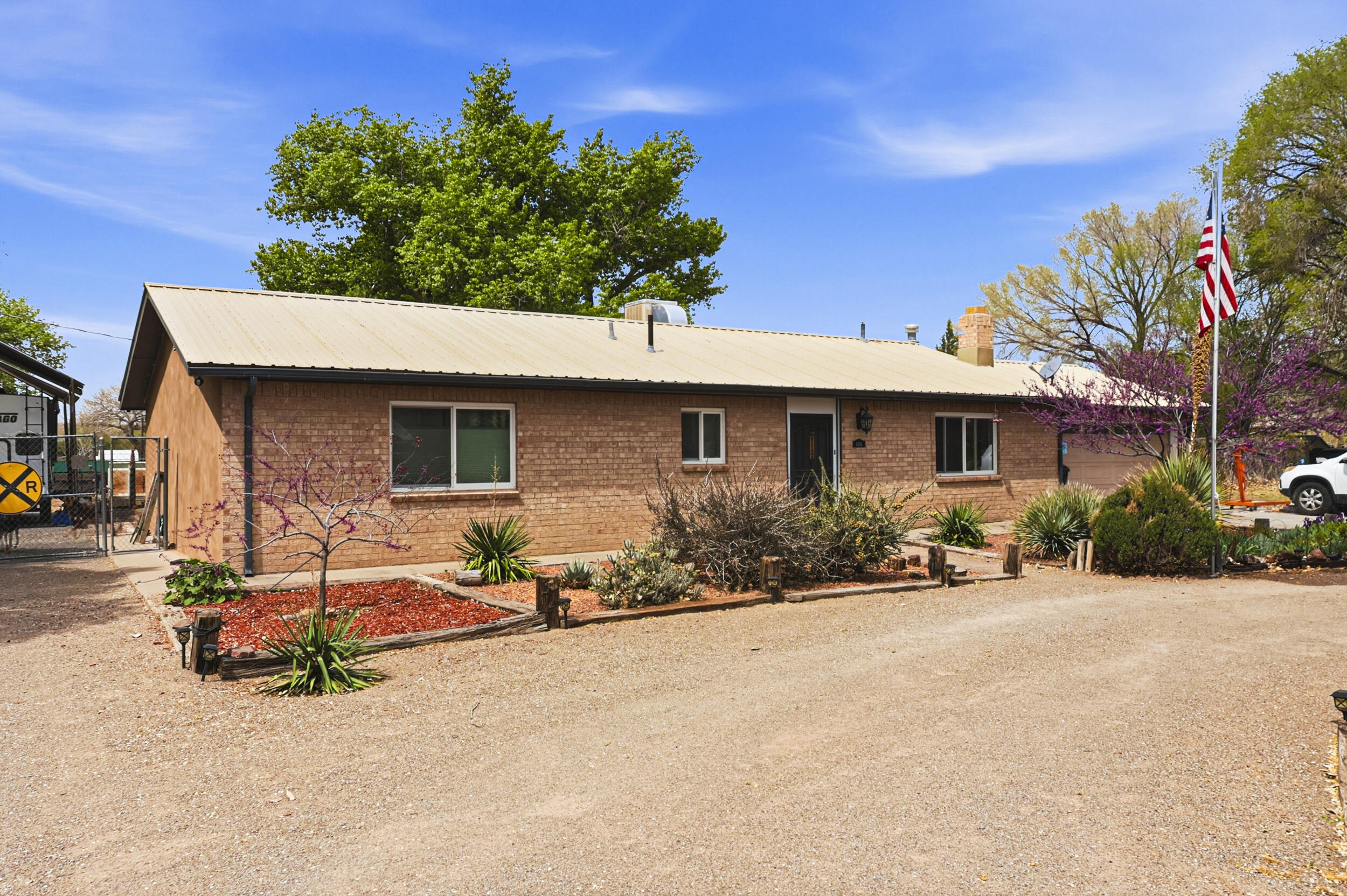 Escape the suburban squeeze without leaving the city! This well maintained 3-bed, 2-bath gem sits on a sprawling .73-acre corner lot, offering the privacy of the country with the convenience of town. Inside, enjoy a stunningly updated kitchen and a layout that reflects true pride of ownership. This lot is a hobbyist's dream, featuring a corner lot with RV access, room for shops, gardens, and toys. Get the acreage you crave with the city amenities you need!