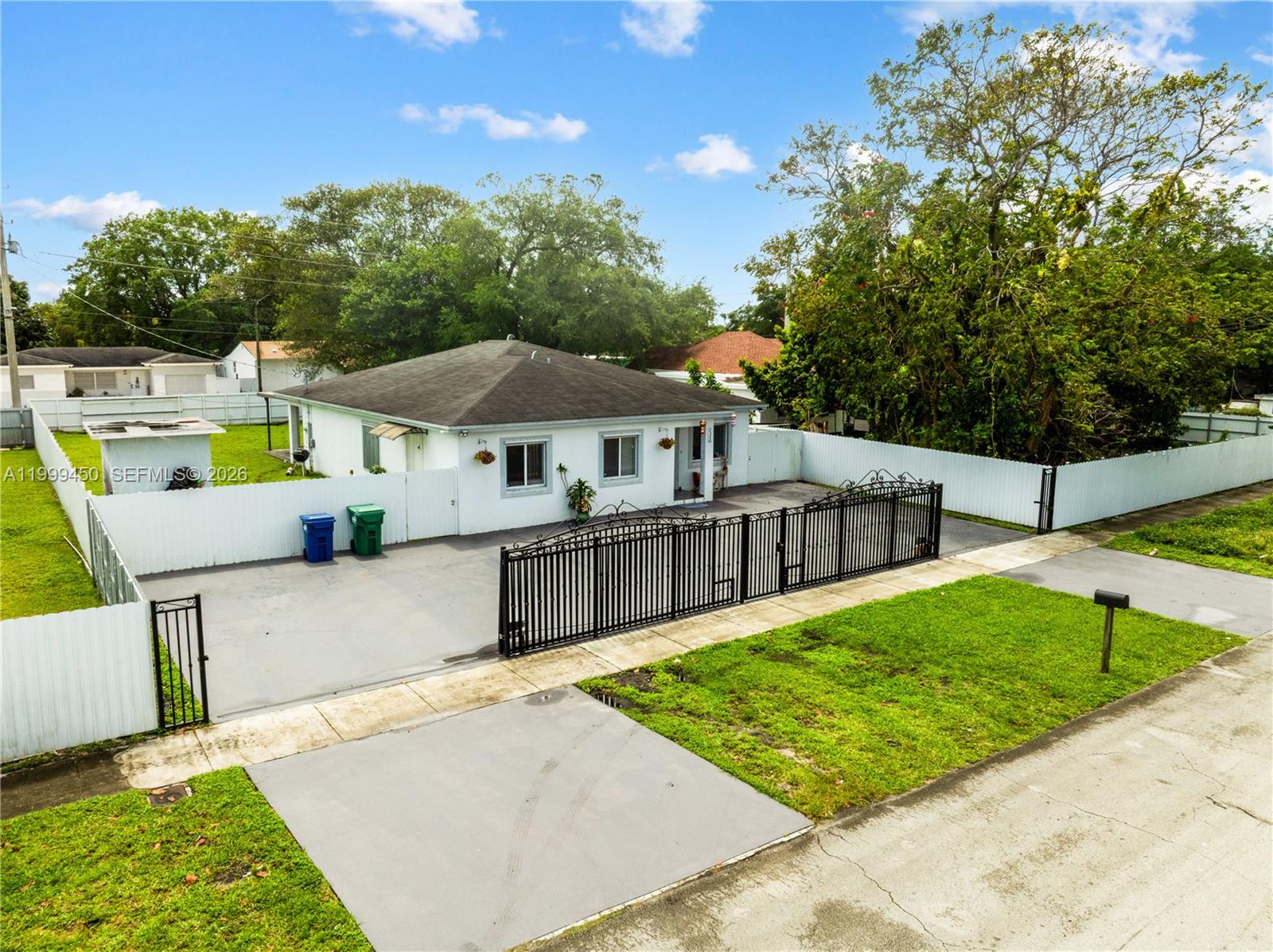 This is the home you’ve been waiting for! Built in 2016, this 4-bedroom, 2-bath features 1,908 sqft of total area,  ceramic tile floors throughout, and a spacious covered terrace perfect for entertaining and BBQs. The oversized yard offers space to build a pool, room for a trailer, rastra, a boat, or an RV, and includes dual access from two streets, with no rear neighbors and a fully fenced lot with an electric gate and a circular driveway. A fantastic opportunity for a growing family or to generate rental income by living in one part and renting the other. Conveniently located between Little River and Miami Shores with easy access to I-95 and major expressways. Don’t miss this opportunity and make it your own!