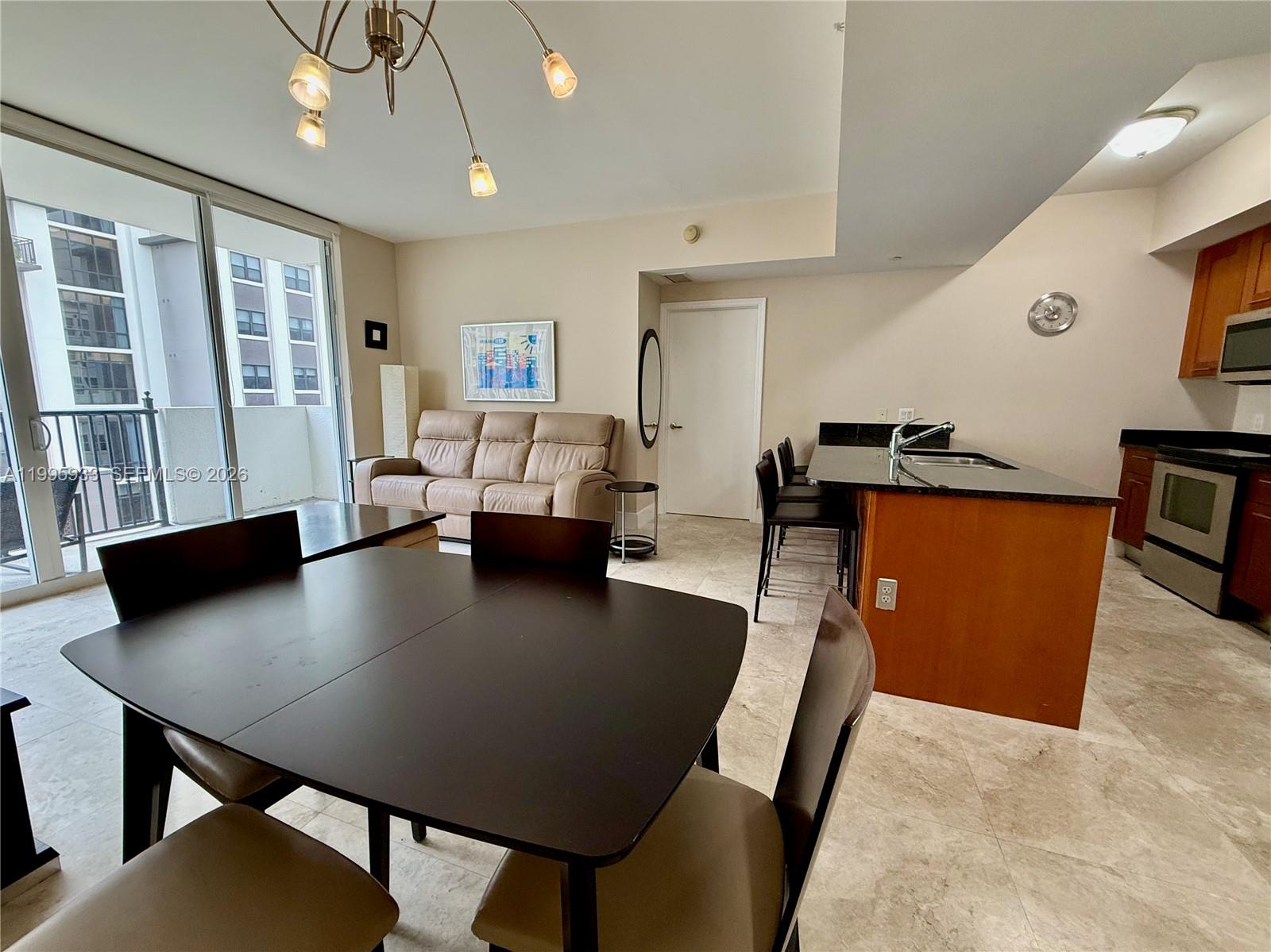 Move-in ready and fully furnished 2-bedroom, 2-bath residence at One Village Place in Coral Gables. This home with modern finishes offers in-unit laundry, resort-style amenities including a pool, fitness center, game room, and 24-hour security. Built with impact windows and doors for peace of mind, the residence combines comfort and safety. Just blocks from the University of Miami and Downtown Coral Gables, and steps from Merrick Park shops, restaurants, supermarkets, spas, and the Metrorail. Simply bring your clothes and personal items — everything else is ready for you. Enjoy secure, hassle-free living in one of Miami’s most desirable neighborhoods.