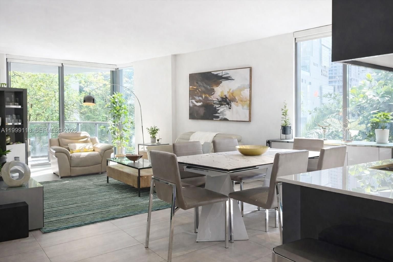 Beautifully remodeled 2BR+den residence at MyBrickell, with owner using the den as a 3rd bedroom, and 2 full baths. Located on the 3rd floor, this well-designed unit offers 1,116 SF, porcelain flooring throughout, impact windows and doors, in-unit washer/dryer, a spacious living and dining area, and a beautifully updated kitchen. Private balcony feels peaceful and relaxed, surrounded by trees and city views. Includes 1 assigned parking space. Building amenities include pool, gym, business center, front desk security, and guest parking. Airbnb allowed with 28-night minimum. Prime location in the heart of Miami’s Financial District, just 1 block from Brickell City Centre and 1 block from Metromover/Metrorail, with restaurants and everyday conveniences nearby. Furniture negotiable. Information is deemed reliable but not guaranteed and subject to errors, omissions, or changes without notice. Buyer and buyer’s agent should independently verify all information, including square footage, rental restrictions, HOA/building policies, room use, and any applicable permits or approvals.