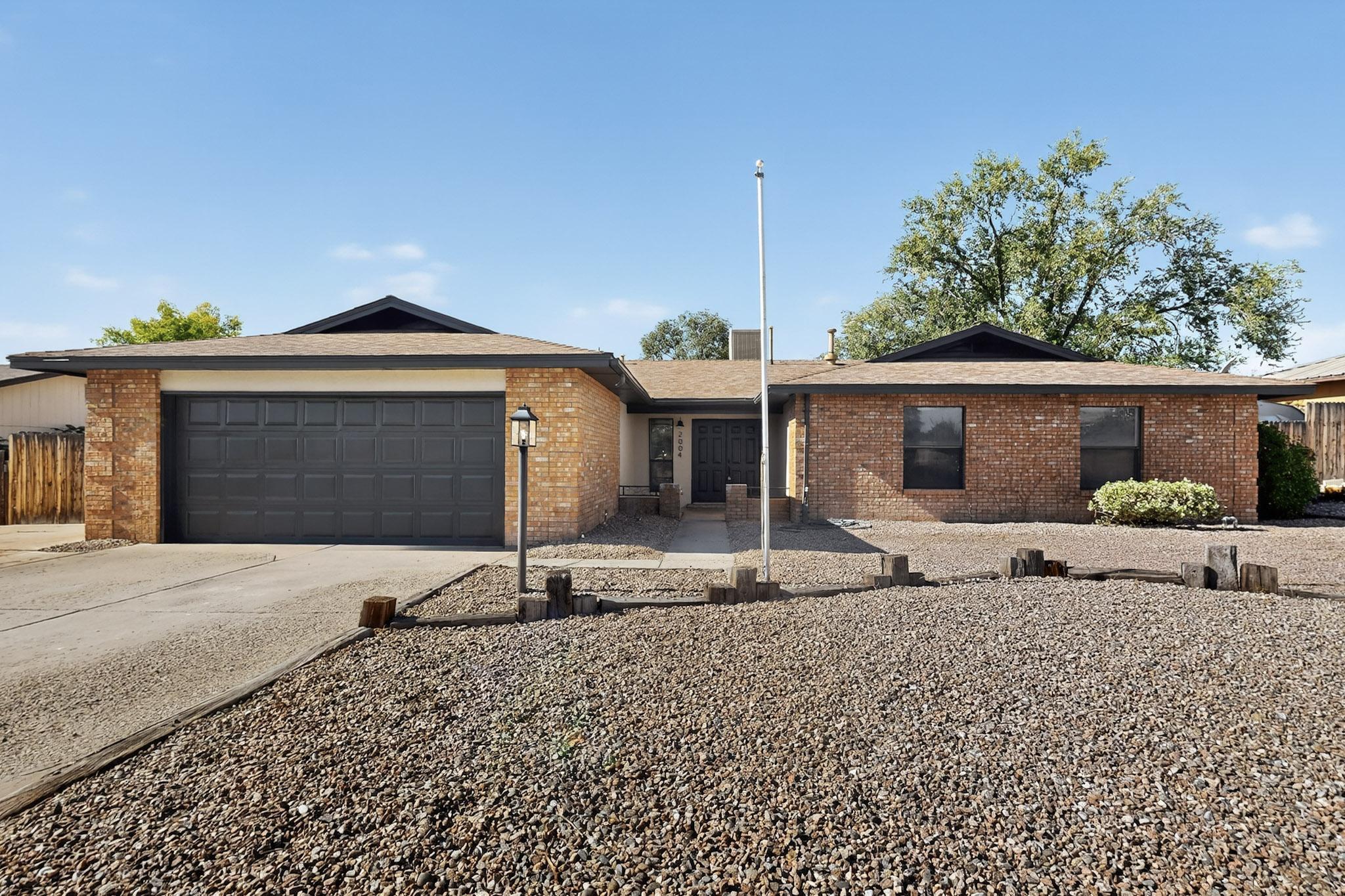 Welcome to this beautifully remodeled Rio Rancho gem, perfectly located near shopping, dining, and everyday conveniences. This move in ready home is packed with upgrades, including a brand new roof, all new windows, fresh interior and exterior paint, new flooring, updated fixtures and hardware, stainless steel appliances, and stylishly remodeled bathrooms. The spacious lot offers backyard access and an incredible private in ground swimming pool, making it the perfect place to relax, entertain, and enjoy sunny New Mexico days. A rare opportunity in today's market, this is the only home in Rio Rancho priced under $400,000 with its own private pool.