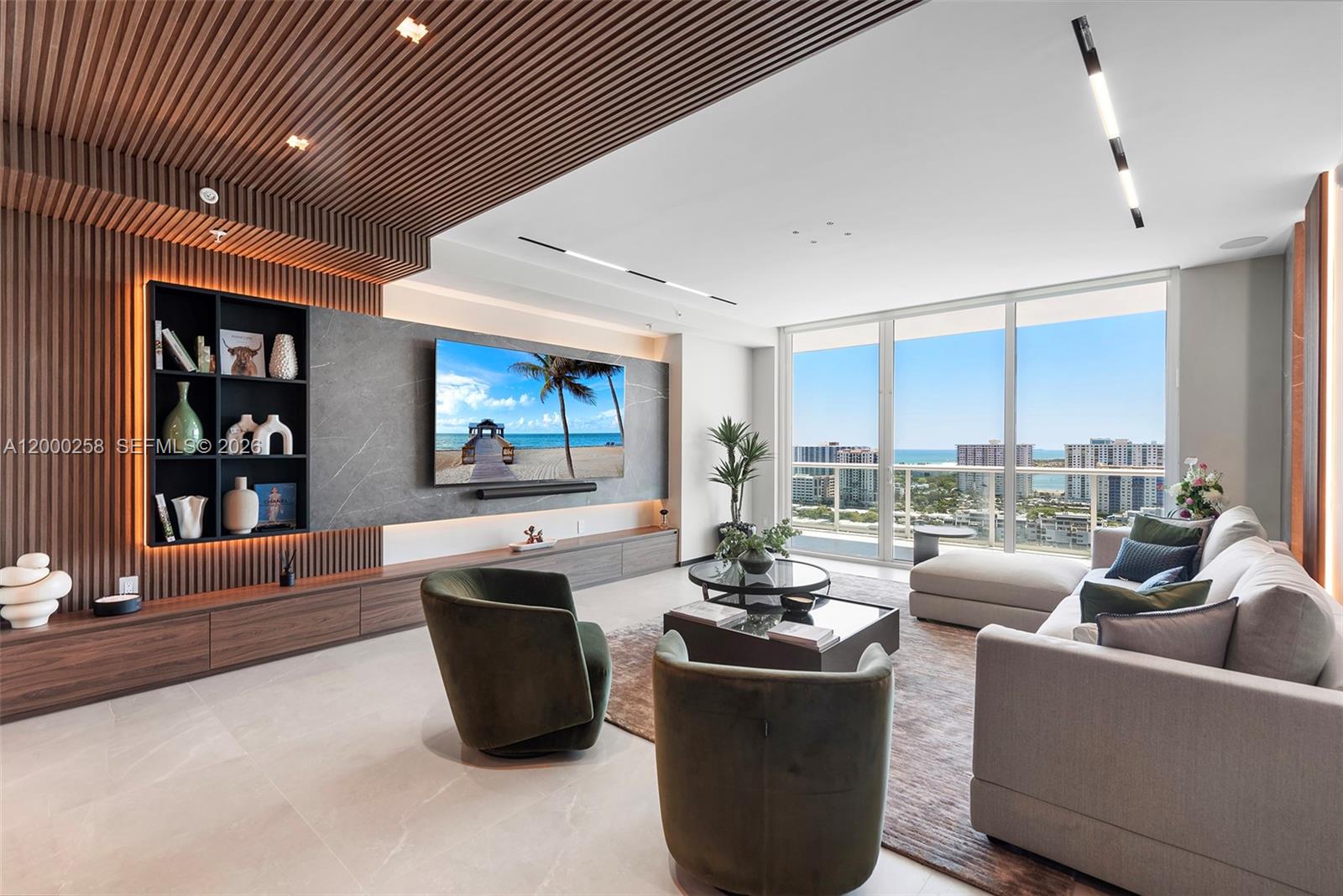 Discover luxury living in this fully furnished turnkey penthouse featuring 3 bedrooms, 3.5 bathrooms, and breathtaking bay and ocean views through floor-to-ceiling windows. The sleek chef’s kitchen is perfect for both everyday living and entertaining. Enjoy an oversized balcony with a spiral staircase leading to a private rooftop oasis with turf and a hot tub. Building amenities include dockage, resort-style pool, sports courts, and a full-service marina, all just minutes from Aventura and Bal Harbour’s best shopping and dining.