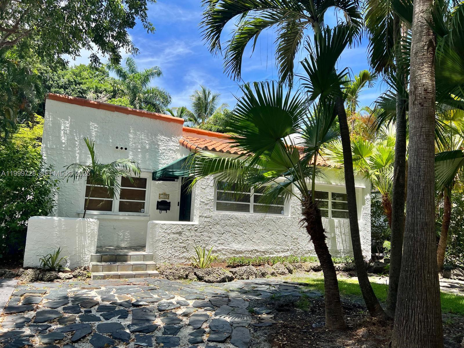 Beautiful Old Spanish residence perfectly located on a low traffic street in well regarded Coral Gables. 2 bedroom, 1 Bath cozy house with generous living spaces. Spacious enclosed entry hall, original pristine wood floors, and updated kitchen. The relaxing backyard includes a garden, roofed patio, ample storage, and studio.