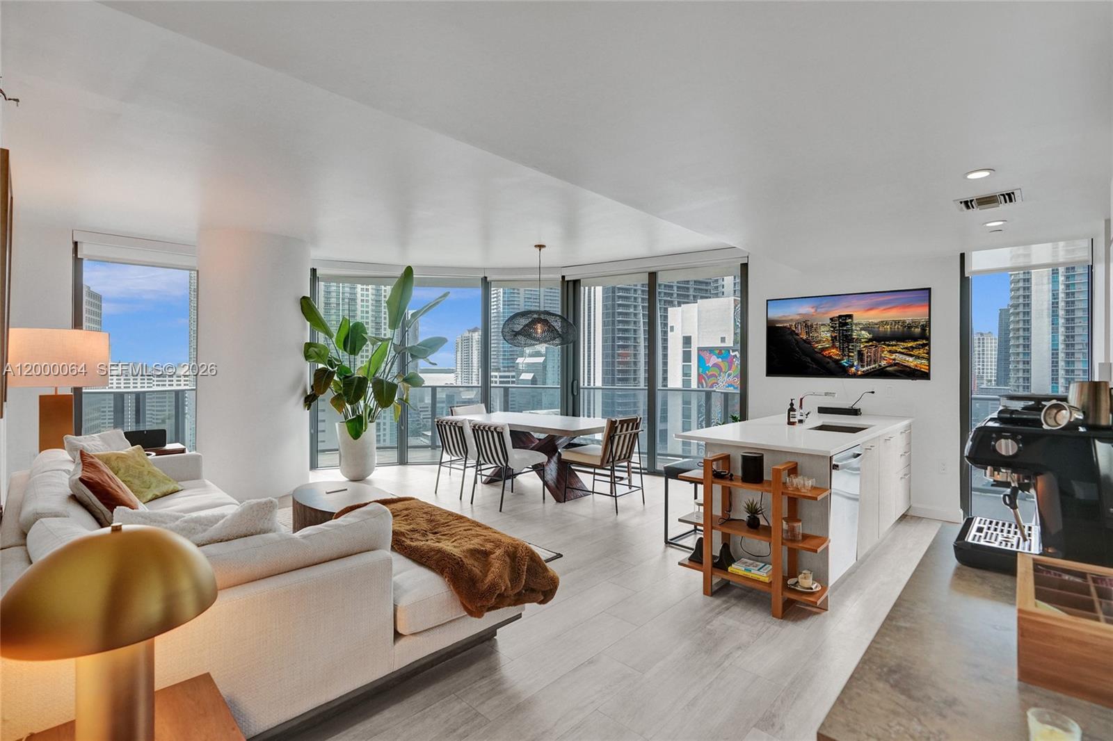 RARELY AVAILABLE DESIRABLE LINE IN THE BUILDING! 2-Bedroom, 2.5 Bath + Den in Brickell’s Heights East Tower.Offered furnished. This corner unit boasts panoramic views of the Intracoastal skylines. Meticulously furnished withhigh-end finishes, including Italkraft cabinetry, sleek contemporary lighting, and floor-to-ceiling impact windows. The expansive wraparound balcony offers seamless indoor-outdoor living. World-class amenities: rooftop sky deck and pool, lap pool, complete spa with steam and sauna, state-of-the-art fitness center, theater room, kids’ playroom, business lounge, and 24/7 white-glove concierge. Live steps from Equinox, Brickell City Center, fine dining, and upscale retail. Minutes to Miami Beach, MIA, Coconut Grove, and Key Biscayne.