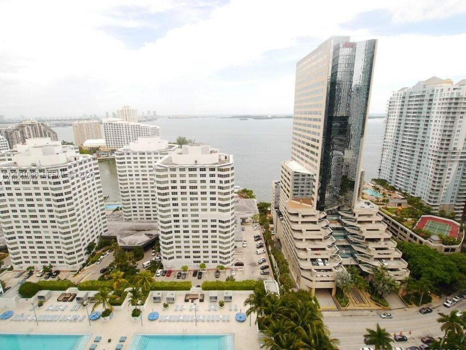 NO SPECIAL ASSESSMENTS! HAS RESERVES FOR LOW DOWNPAYMENT! Stunning condo with unobstructed bay views from the living room and bedroom! Fully furnished with an in-unit washer and dryer for added convenience. Located in a state-of-the-art, full-service building offering top-tier amenities, including a gym, pool with cabanas, activity and conference rooms, valet, and 24-hour security. Comes with 1 assigned parking space. Perfect for luxury living in a prime location!