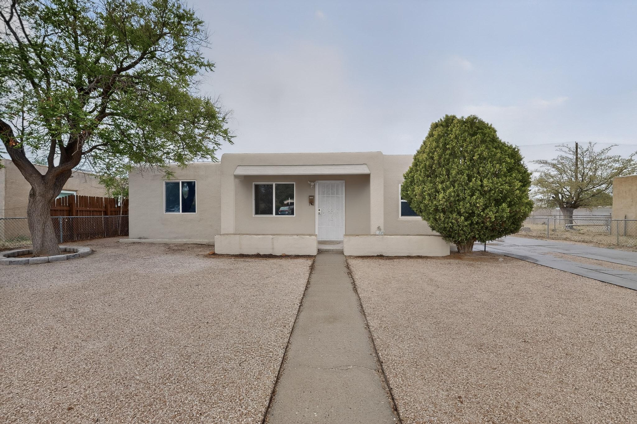 Welcome home to this Move-in ready, freshly updated gem, well under $300k. This charming 3 bed, 2 bath abode has a slew of upgrades to include: Freshly painted throughout, luxury vinyl plank flooring & all new light fixtures. New kitchen cabinets and counters tops & TPO Roof, in 2023. Brand new water heater and Refrigerated Air! All appliances convey including Washer and Dryer. HUGE lot with backyard access from FRONT & BACK alley. Convenient NE Heights location by restaurants, shopping, freeway access & so much more! Come see it, before it's gone...***OPEN HOUSE - THIS Saturday, April 18th from 10am - 1pm***