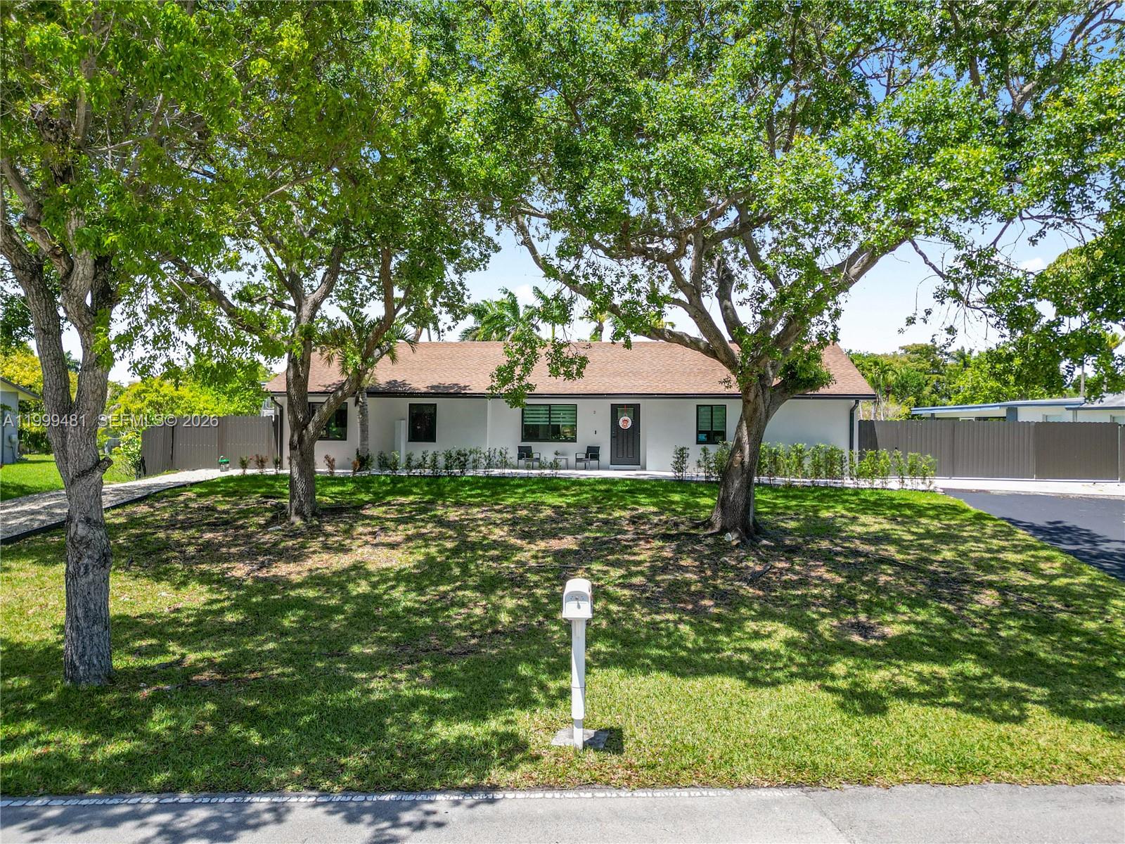 STUNNING North Cutler Bay gem in a highly sought-after location! This fully upgraded 3-Bedroom 2-Bath home features a show-stopping kitchen with massive Quartz waterfall island and continuous Quartz backsplash, this home is designed for everyday living and entertaining. Enjoy peace of mind with all impact windows and doors, PVC plumbing, and fully remodeled bathrooms. This home showcases a seamless look with the same tile flooring throughout, complemented by recessed lighting for a sleek, modern ambiance. The primary suite is your own private retreat, complete with a separate shower and a standalone soaking tub. A versatile additional living area with laundry provides flexible use- perfect for a playroom, home office, or multi-purpose space. Situated on an expansive 16,117 sq ft lot this property is a dream for boat or RV owners. The property offers two double gates, parking for RV’s, boats, or multiple vehicles, and dedicated concrete slabs for additional storage. Two sheds provide ample storage space, making this property as practical as it is beautiful.  A rare combination of style, space, and functionality- this is South Florida living at its best. Our community has many family events like golf cart parades, chili cook-offs, wing-fests and much more. Just minutes from downtown Cutler Bay, the Turnpike, and popular Black Point Marina.