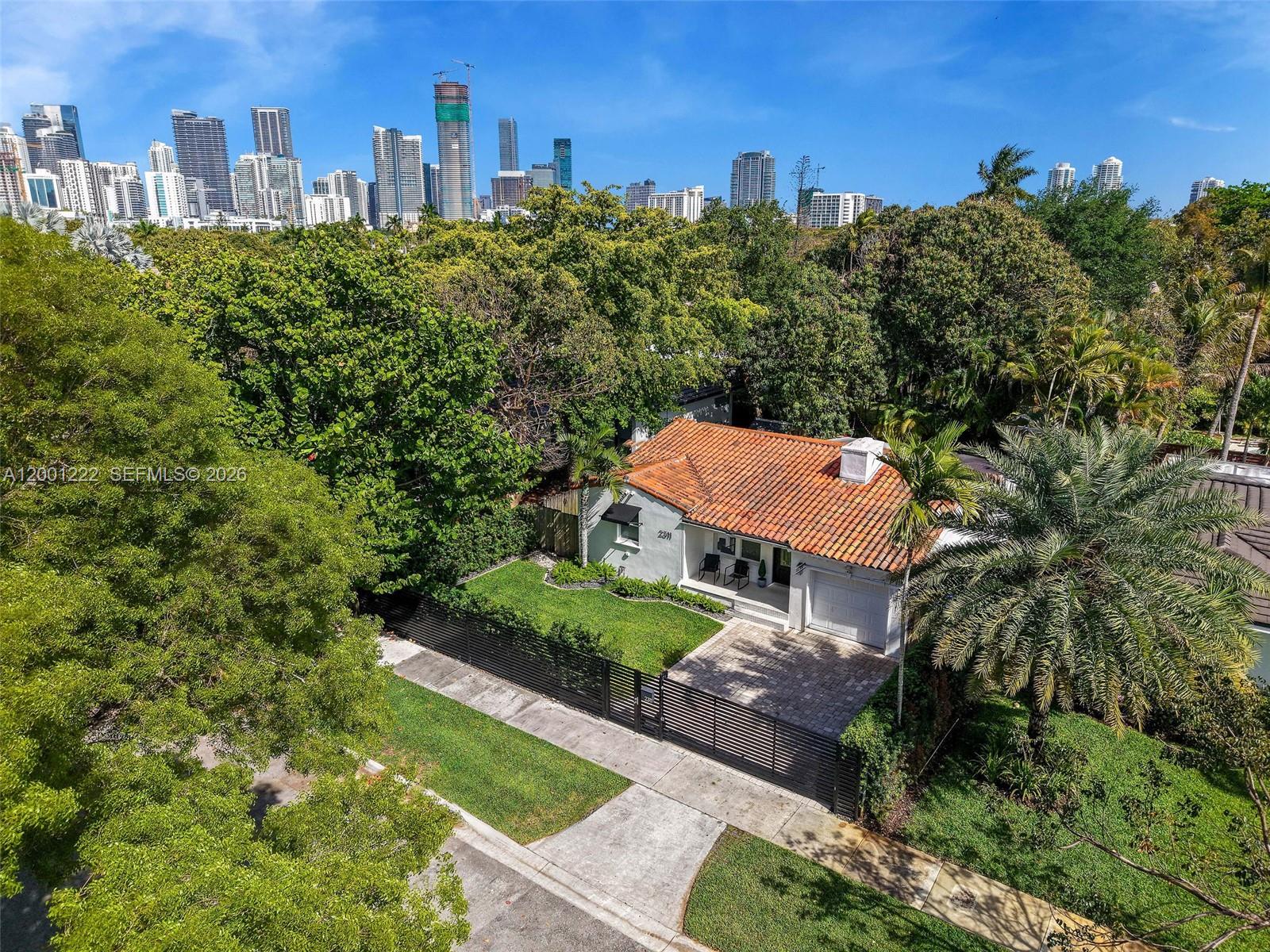 Elegantly remodeled single-family home located in the heart of The Roads, now available for rent. This 1,807 sq ft residence features three bedrooms and two full bathrooms, thoughtfully designed with a fully open-concept layout where the living, dining, and kitchen areas flow seamlessly together—perfect for both everyday living and entertaining.The home includes two well-appointed junior suites, along with a spacious primary bedroom offering generous closet space and an expansive en-suite bath. Step outside to enjoy an exceptionally large backyard, ideal for relaxing or hosting, plus the convenience of an attached garage.Perfectly positioned, you’re just 10 minutes from Brickell, Downtown, and Coral Gables, and only 15–20 minutes from Miami Beach, Coconut Grove, and Miami International Airport. A true urban oasis—close to everything, yet nestled in a quiet, tree-lined neighborhood.Available JunePlease text or use showing assist to coordiante appointments, between 1:30PM-7:30PM 24 notice required