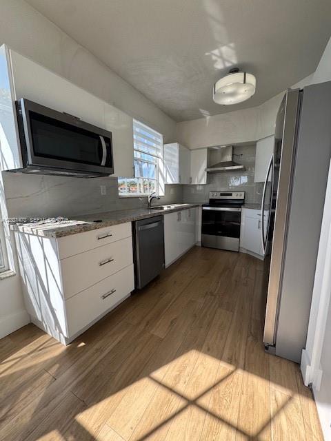 Modern kitchen with designer features at 14621 Balgowan Rd - Townhouse in Miami Lakes