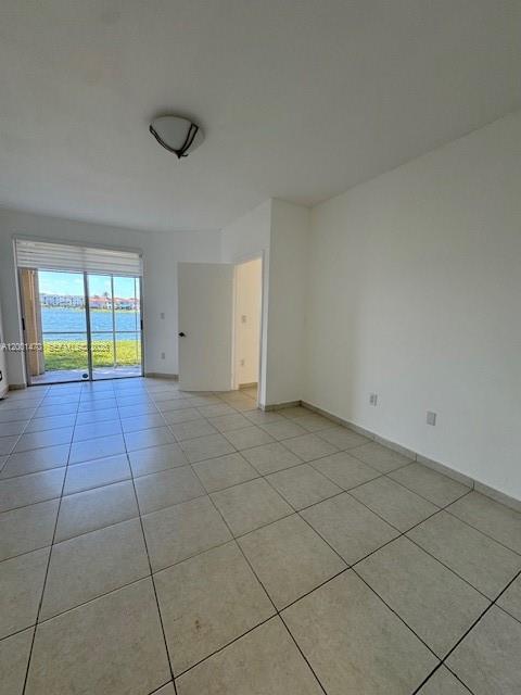 Well-appointed guest bedroom at 14621 Balgowan Rd - Townhouse in Miami Lakes