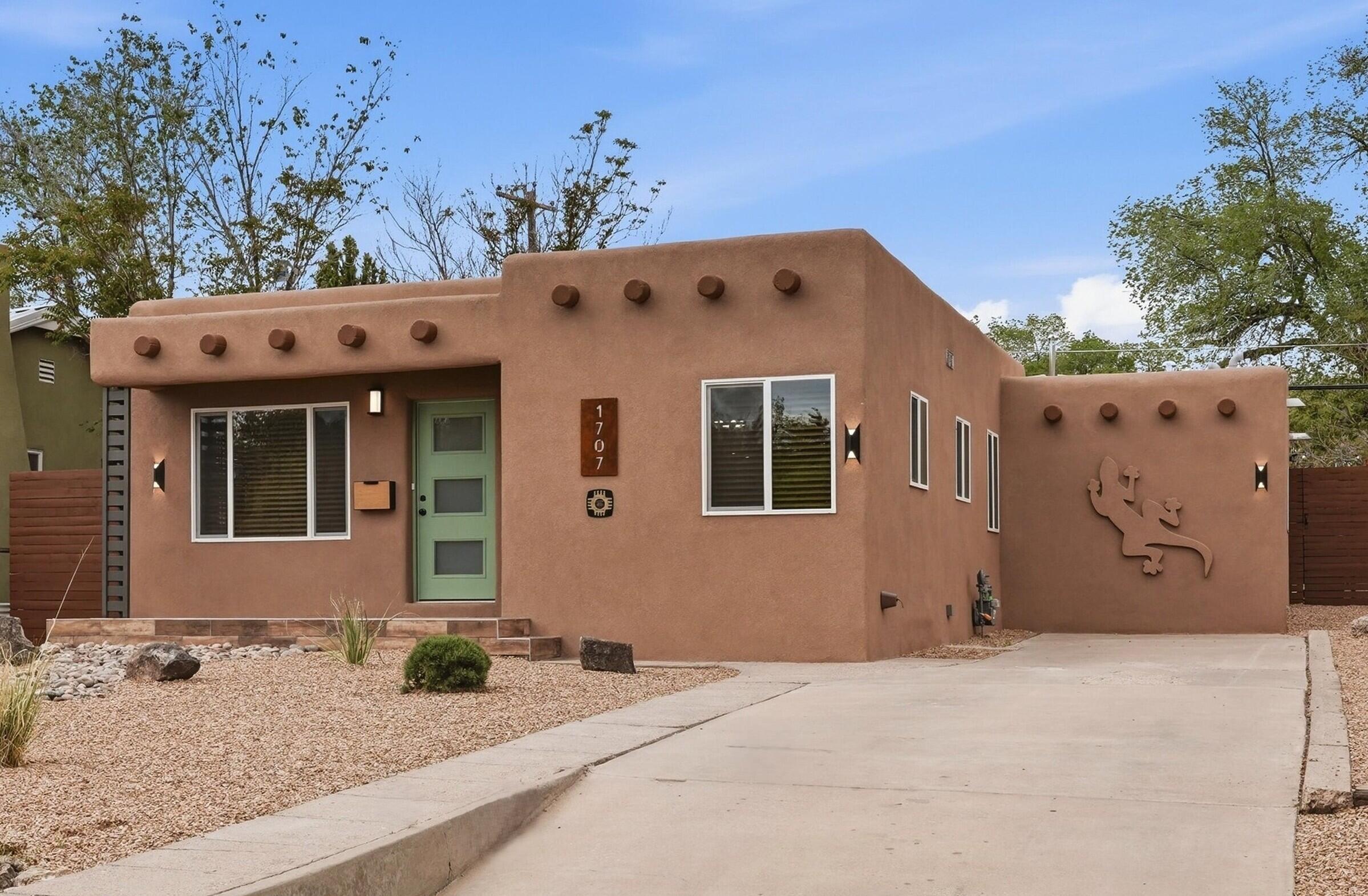Come see this beautifully remodeled Ridgecrest home with a light, bright interior full of high-end style and warm cozy charm. Brand new kitchen has custom handmade hardwood cabinets, quartz counters and  stainless appliances. Floorplan flows through two family room areas and includes a huge primary bedroom, plus both baths have been completely remodeled with new tubs, tile, plumbing and fixtures. Fully updated with every major system replaced... new roof, new stucco, new thermal pane windows, new refrig A/C, and all new paint, texture, lighting and trim throughout. Located among Ridgecrest's tree-lined streets and just minutes from Nob Hill, UNM, hospitals, and KAFB, this is a turnkey property for buyers who appreciate quality and want a home that stands apart from the typical remodel.