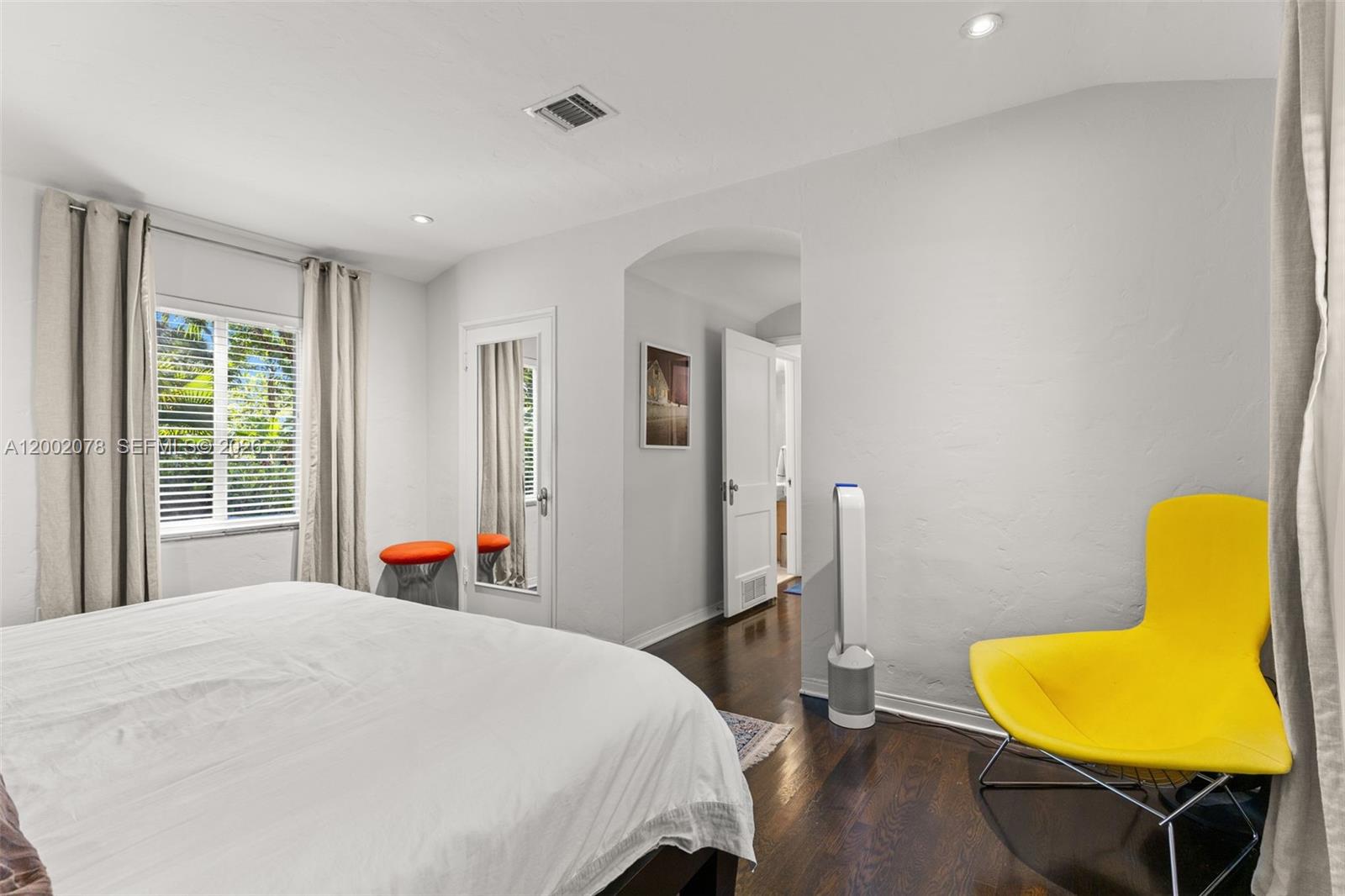 Well-appointed guest bedroom at 482 93rd St - Home in Miami Shores