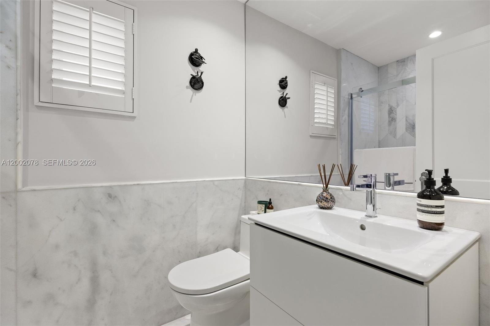Open-concept living area at 482 93rd St - Home in Miami Shores