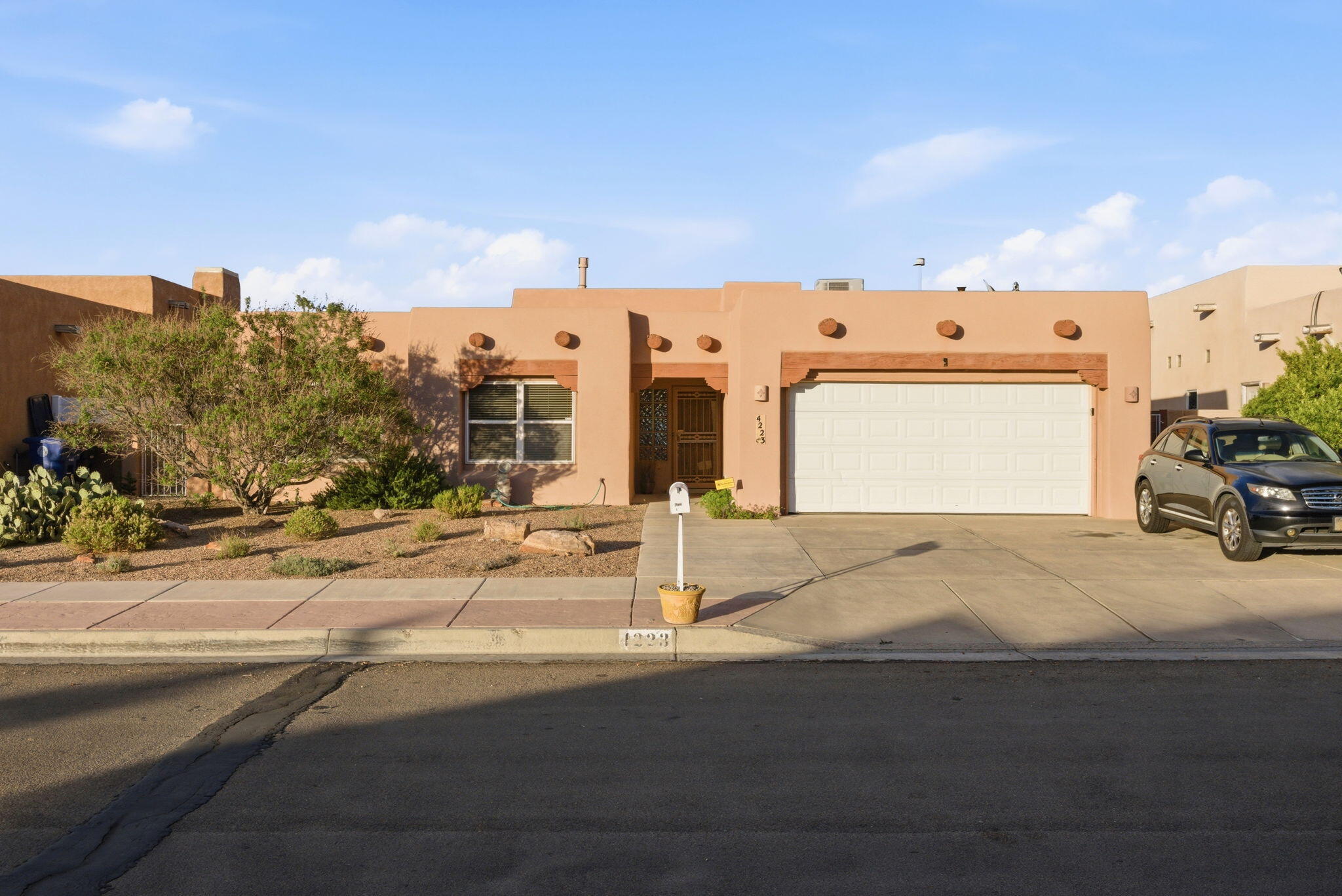 Welcome to your new sanctuary in New Vistas! This beautifully designed single-story home by Joseph Homes offers breathtaking panoramic views and an expansive layout perfect for family gatherings or peaceful evenings. Vaulted ceilings and large windows create an airy, open feel in the living area, complemented by a charming Kiva fireplace. The stylish kitchen features custom-built cabinets and high-end Bosch appliances, making cooking and entertaining a delight. Retreat to the generous master suite with ample storage and MB bathroom featuring a double vanity and a separate garden tub and shower. Step outside to the large covered porch, perfect for morning coffee or evening relaxation. With a tankless water heater, central vacuum, and more, this home combines modern comfo