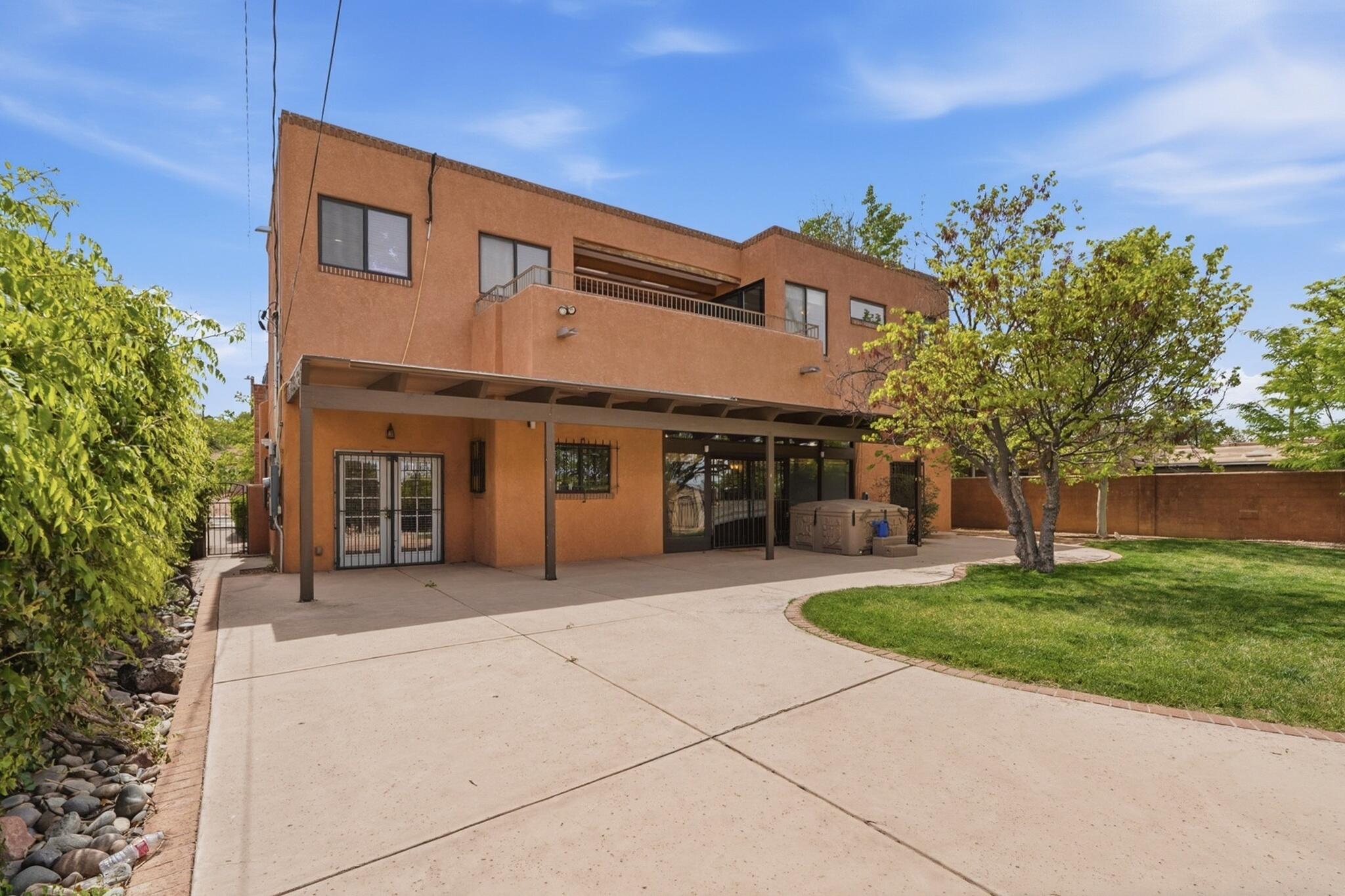 Photo 3 of Single family home for sale at 1405 Sigma Chi Rd Ne, Albuquerque, NM 87106 | MLS# 1102046 | Listing updated on 2026-09-15