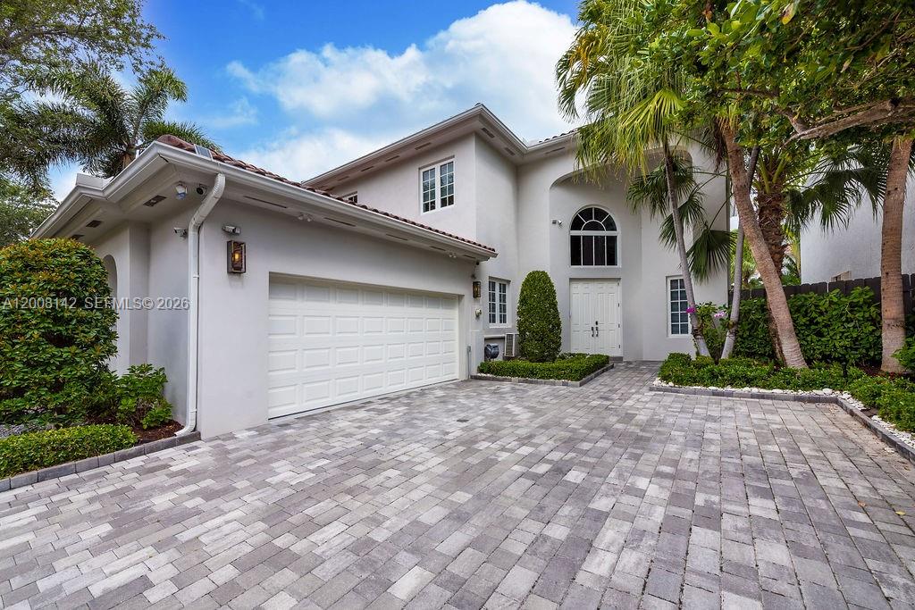 Live just steps from the beach in the private gated community of Golden Gate Estates, perfectly located between Golden Beach and Sunny Isles. This elegant 2-story 4 bedrooms home offers over 2,500 sq ft of bright open living space with high ceilings and great indoor-outdoor flow. The kitchen features granite countertops, custom cabinetry, and a breakfast area overlooking the private backyard and pool — ideal for relaxing or entertaining. Community amenities include 24/7 security, marina access, and a playground. Prime location near Aventura Mall, top schools, and dining.