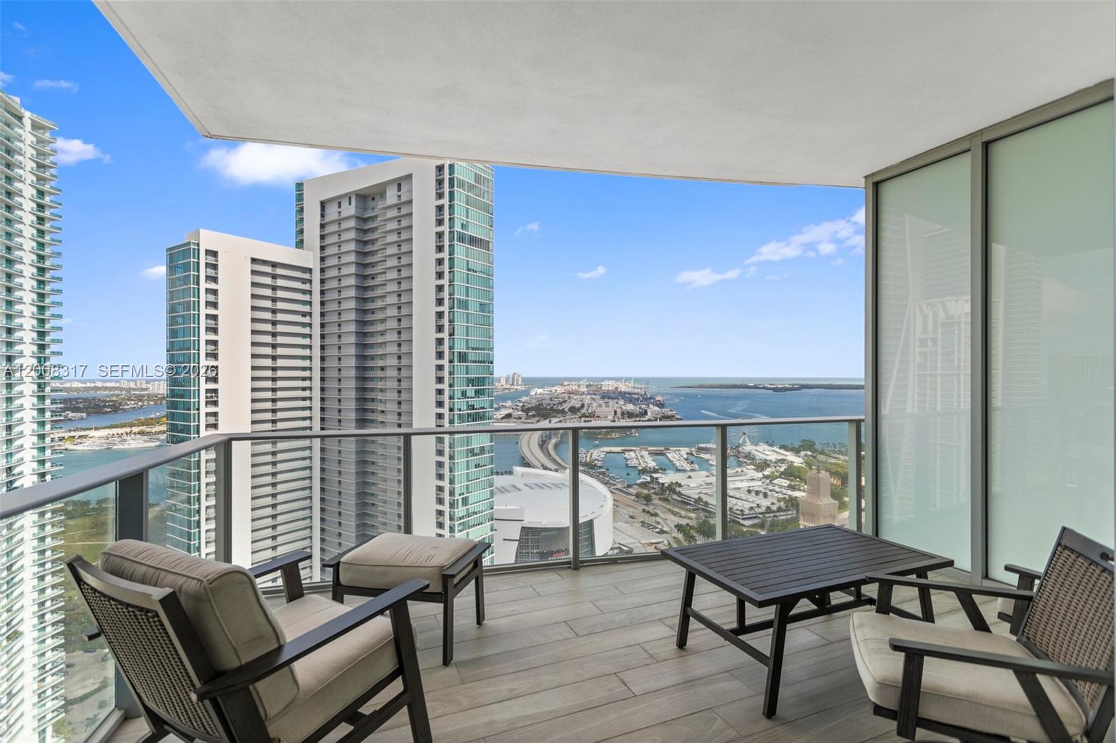 Experience luxury living at its finest in this spectacular residence at Paramount Miami Worldcenter. Featuring 2 bedrooms plus an open den (ideal as a home office or third bedroom) and 3 full bathrooms, this unit offers a private elevator and foyer, 10-ft ceilings, and floor-to-ceiling windows that fill the space with natural light. The European kitchen boasts top-tier appliances and sleek finishes. Enjoy breathtaking bay and city views from the oversized balcony, perfect for relaxing or entertaining. Paramount offers resort-style amenities including pools, spa, fitness center with boxing ring, basketball half court, tennis, racquetball, virtual golf, yoga, soccer field, EV charging, and valet. Prime location near airport, Brightline, Kaseya Center, Bayside, and top restaurants.