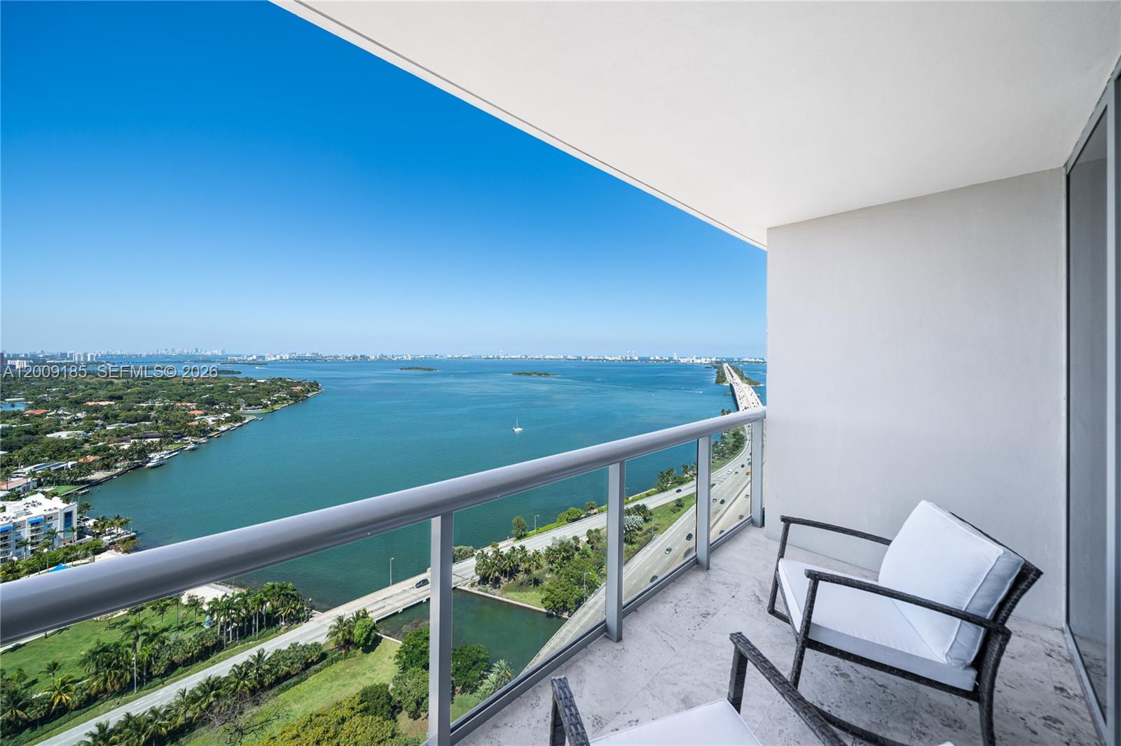 This stunning 1 bed, 1.5 bath apartment offers breathtaking bay views and a bright split layout with floor-to-ceiling windows. Features include marble floors, quartz countertops, stainless steel appliances, and an en suite bedroom with built-in closets. Enjoy resort-style amenities: 2 heated pools, gym, sauna, jacuzzi, BBQ area, theater rooms, business center, and 24-hour security. Ideally located in Edgewater, just minutes from Wynwood, Midtown, Design District, Downtown, and Miami Beach. Washer & dryer in unit.
